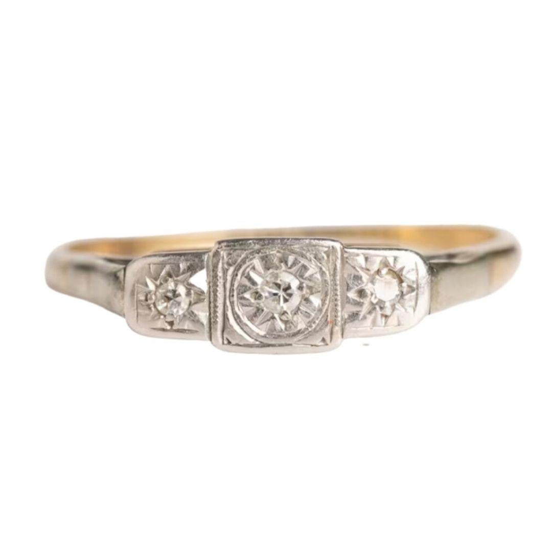 This lovely art deco 18ct gold and platinum ring would be a lovely addition to your jewelry collection or a beautiful gift for someone you love and admire. The ring has three shiny old-cut diamonds set in platinum which looks very glamorous on the