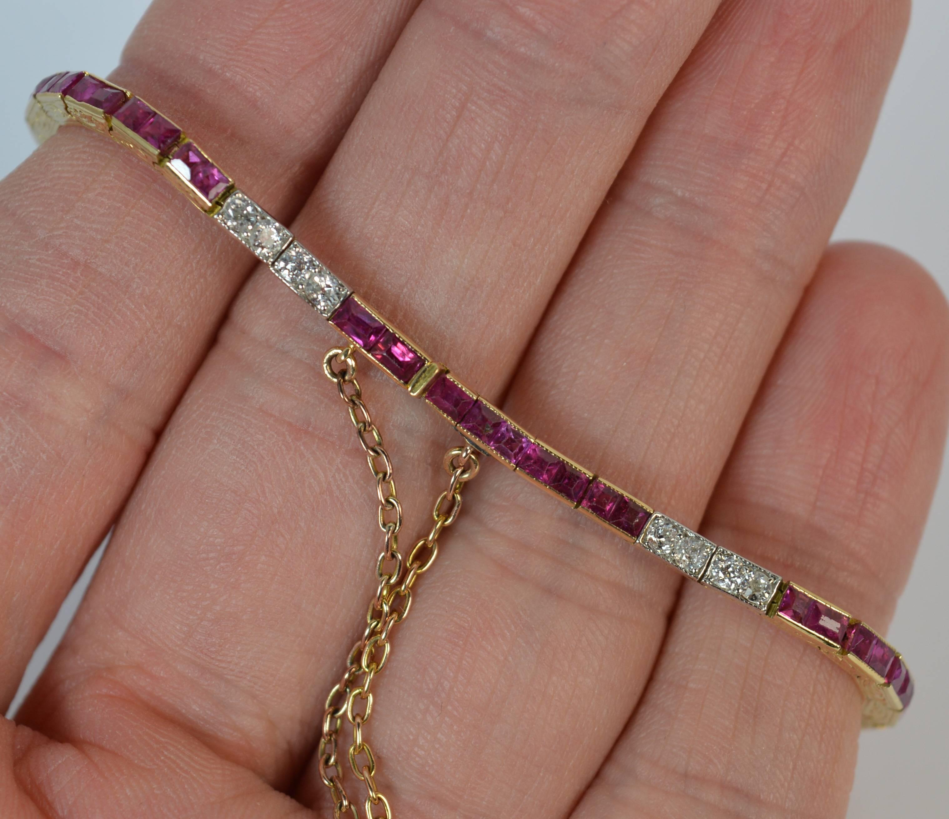 A stunning Art Deco period bracelet. Fantastically designed with four sections of four old cut diamonds and four sections of princess cut rubies. The diamonds mounted into platinum grain settings with the rubies and remainder of the bracelet in 18