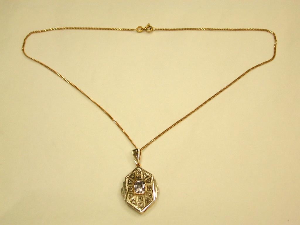 Art Deco 18ct & Silver Synthetic Sapphire & Diamond Set pendant, later 9ct Chain
This pretty pendant is dated circa 1930.
The diamonds are set in silver and the Synthetic sapphire is millgrain set in gold.
The back of the pendant is all 18ct gold.
