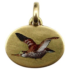 Charm con uccello piovanello in oro 18 carati e smalto Art Deco