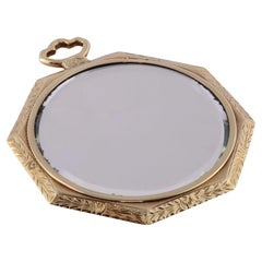 Miroir Art Déco en or 18 carats