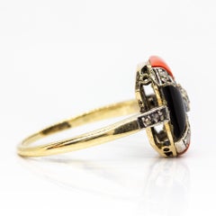 Art Deco 18 Karat Gold and Platinum Coral, Onyxes and Diamonds Ring