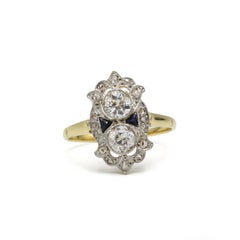 Art Deco 18K Gold Ring with Old Mine Diamonds and Calibrated Sapphires