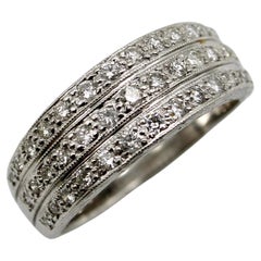 Bracelet Art déco en or 18 carats à trois rangées de diamants pavés