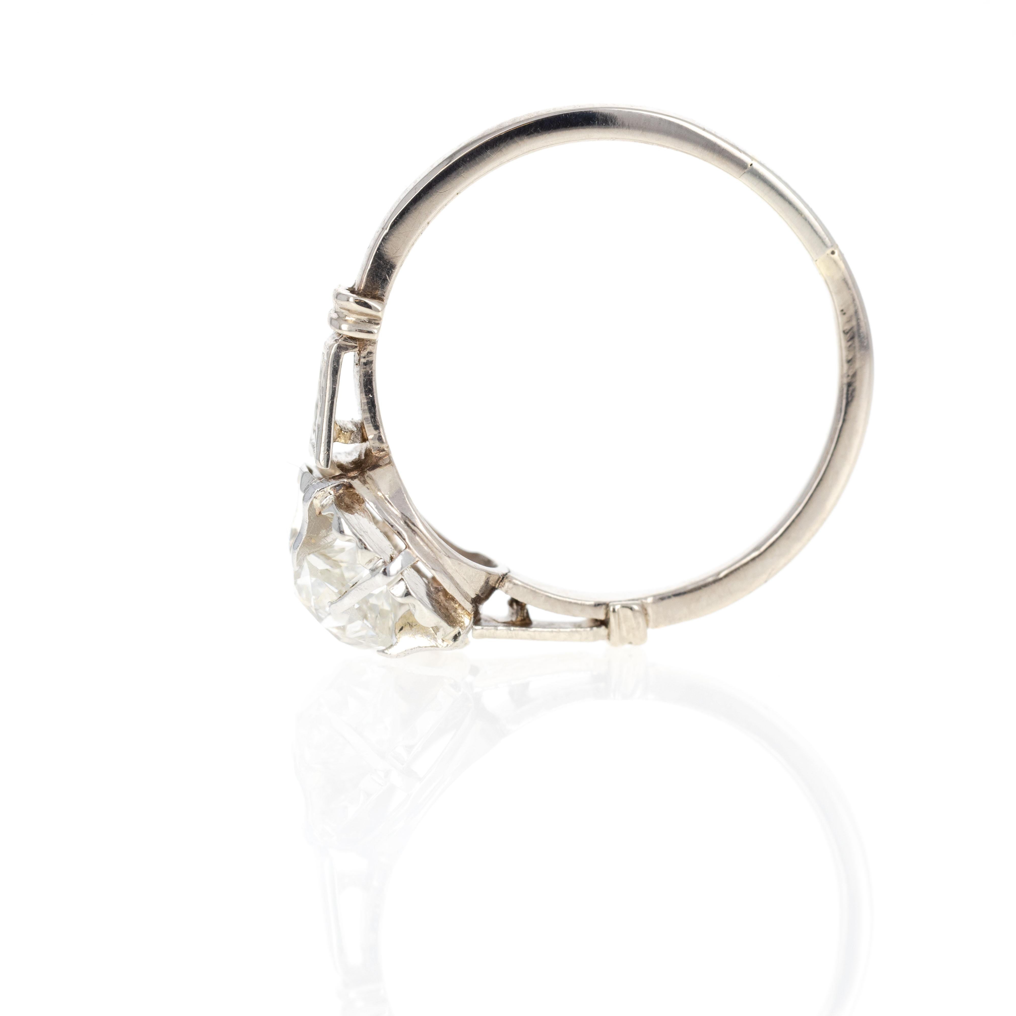 Era: Art Deco

Composition: 18K White Gold

Primary Stone: Old Mine Cut Diamond

Carat Weight: Approximately 0.75 Carats

Color/Clarity: H / VS2

Ring Size: 7.5

Ring Weight: 2.6 Grams

Item Barcode: 290242