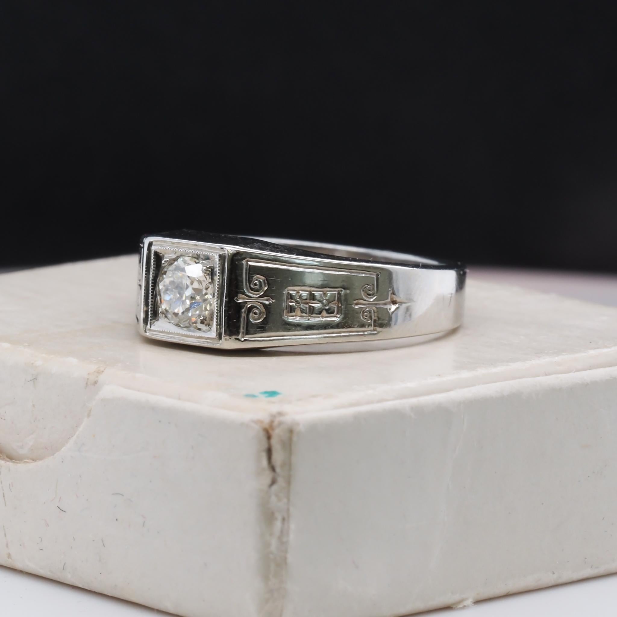 Ring Size: 9
Metal Type: 18k White Gold [Hallmarked, and Tested]
Weight: 6.0 grams
‌
Diamond Details:
Weight: .45ct
Cut: Old European Brilliant
Clarity: VS1
Color: I
‌
Band Width: 3.75 mm
Condition: Excellent