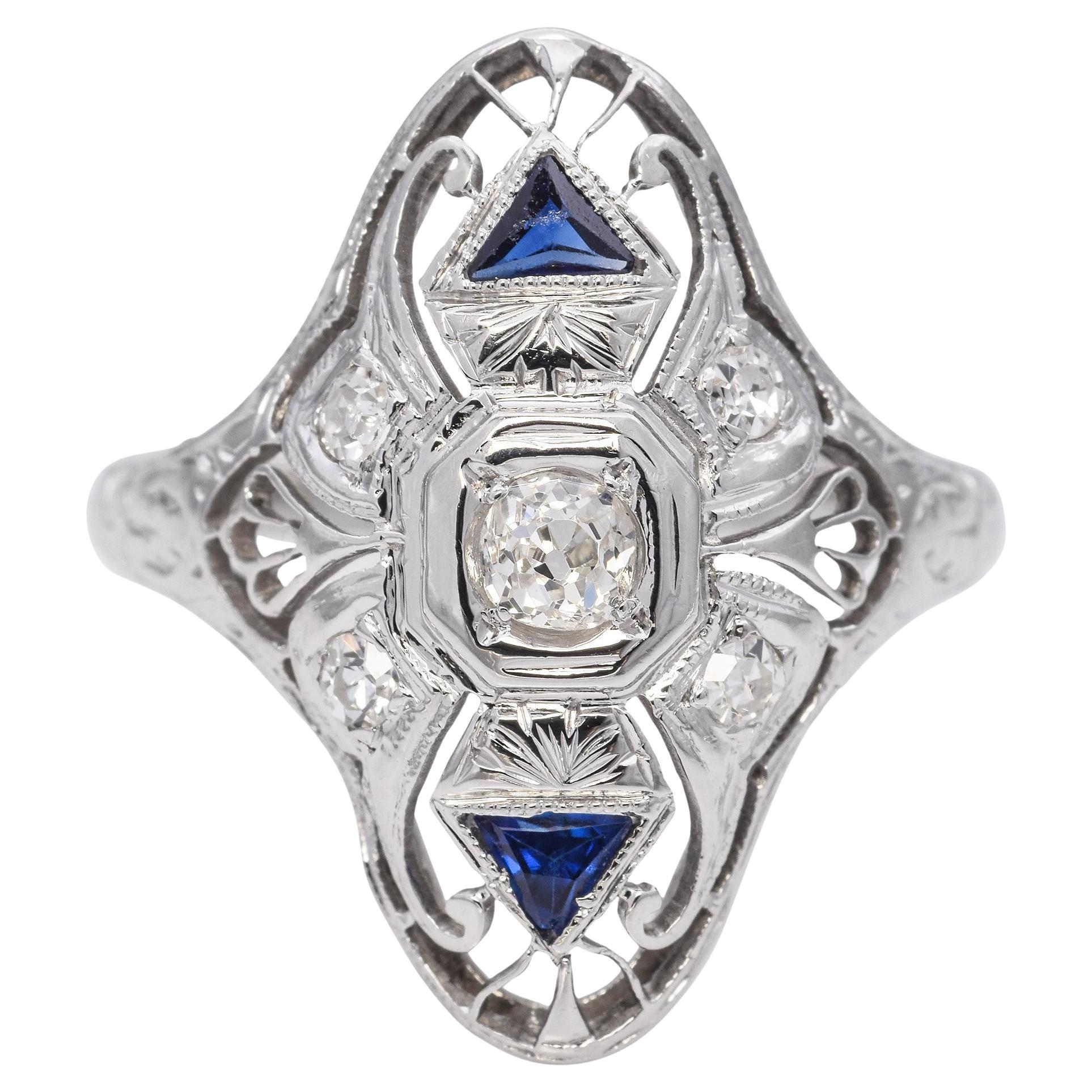 Art Deco 18k White Gold Diamond and Sapphire Filigree Dinner Ring For Sale