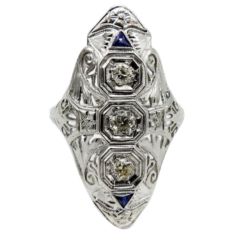 Bague Art déco en or blanc 18 carats avec diamants et saphirs