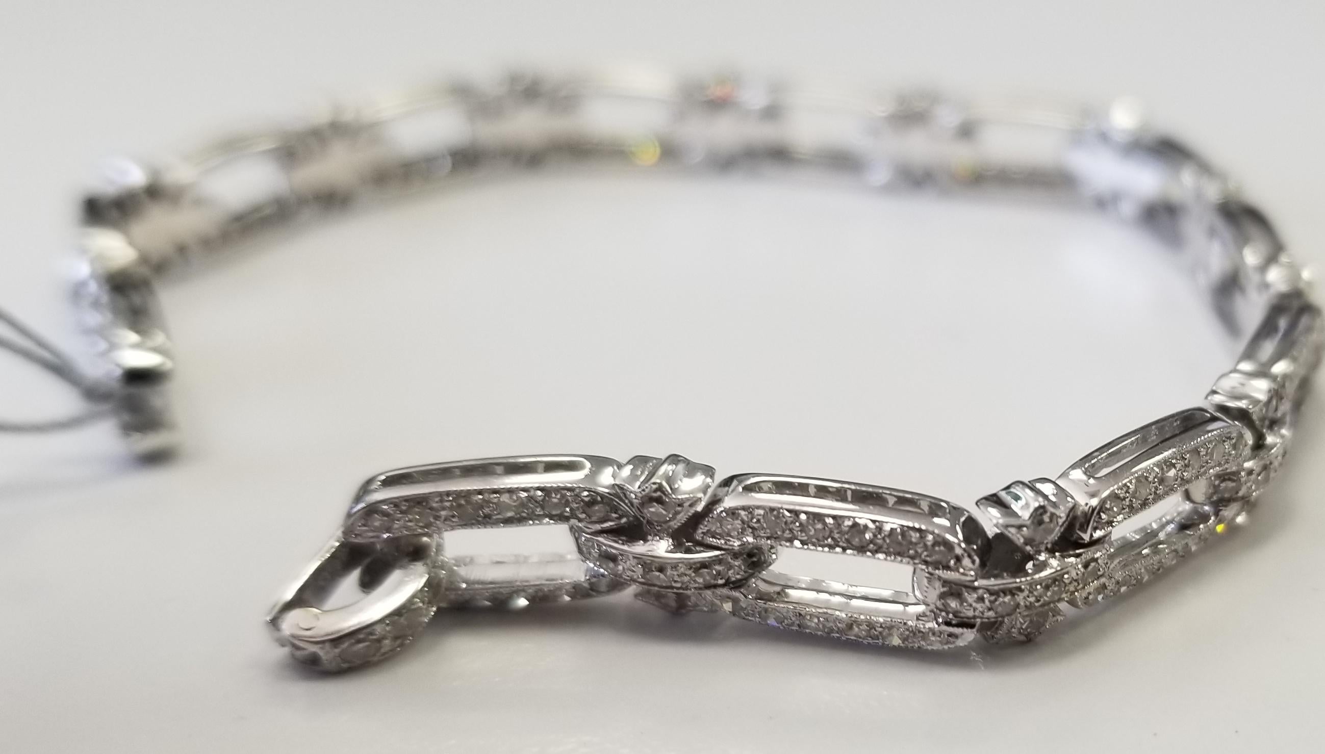 Art Deco Style 18k white gold diamond bracelet .90cts., containing 244 single cut diamonds weighing .90cts.  the bracelet measures a little over 6 1/2 inches.  