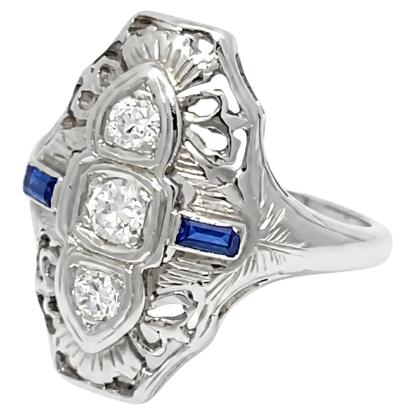 Art Deco 18k White Gold Filigree Ring with Old Cut Diamonds & Blue Sapphires For Sale