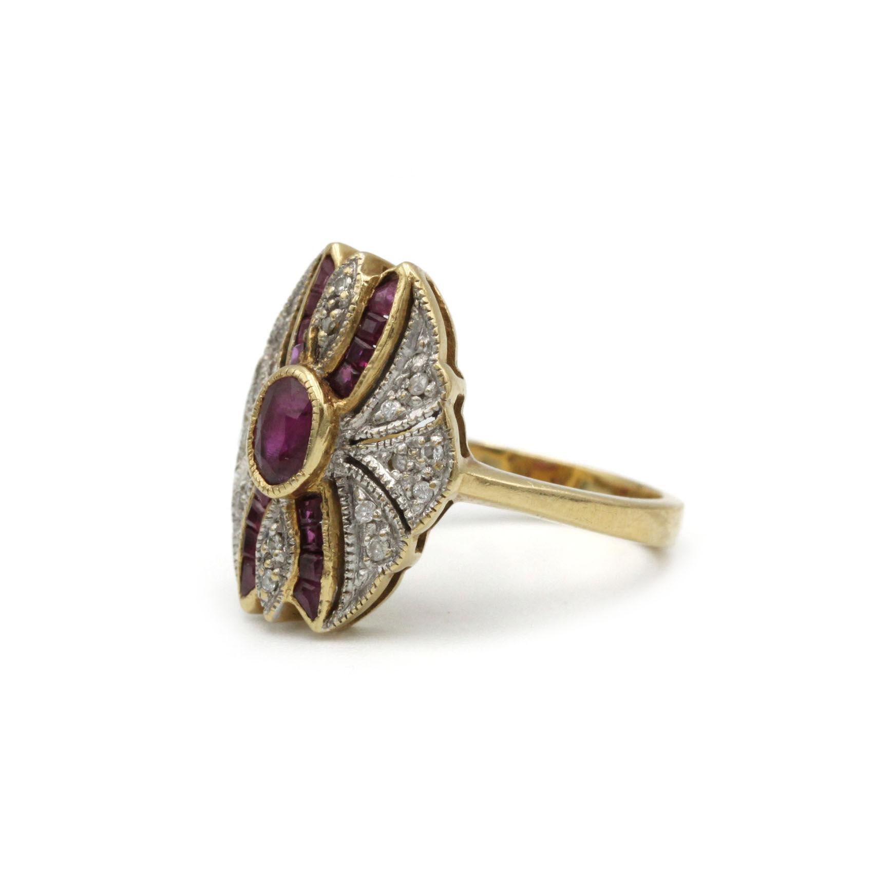 Channel the glamour of the Jazz Age with this authentic Art Deco cocktail ring, masterfully crafted in 18K yellow gold (750‰). At its heart sits a vivid oval ruby (approx. 0.15 ct) bezel-set within a geometric, marquise-shaped plaque. Surrounding