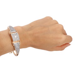 Art Deco 18kt Gold Bangle Universal Geneve Watch with 4.40 CTW in Diamonds