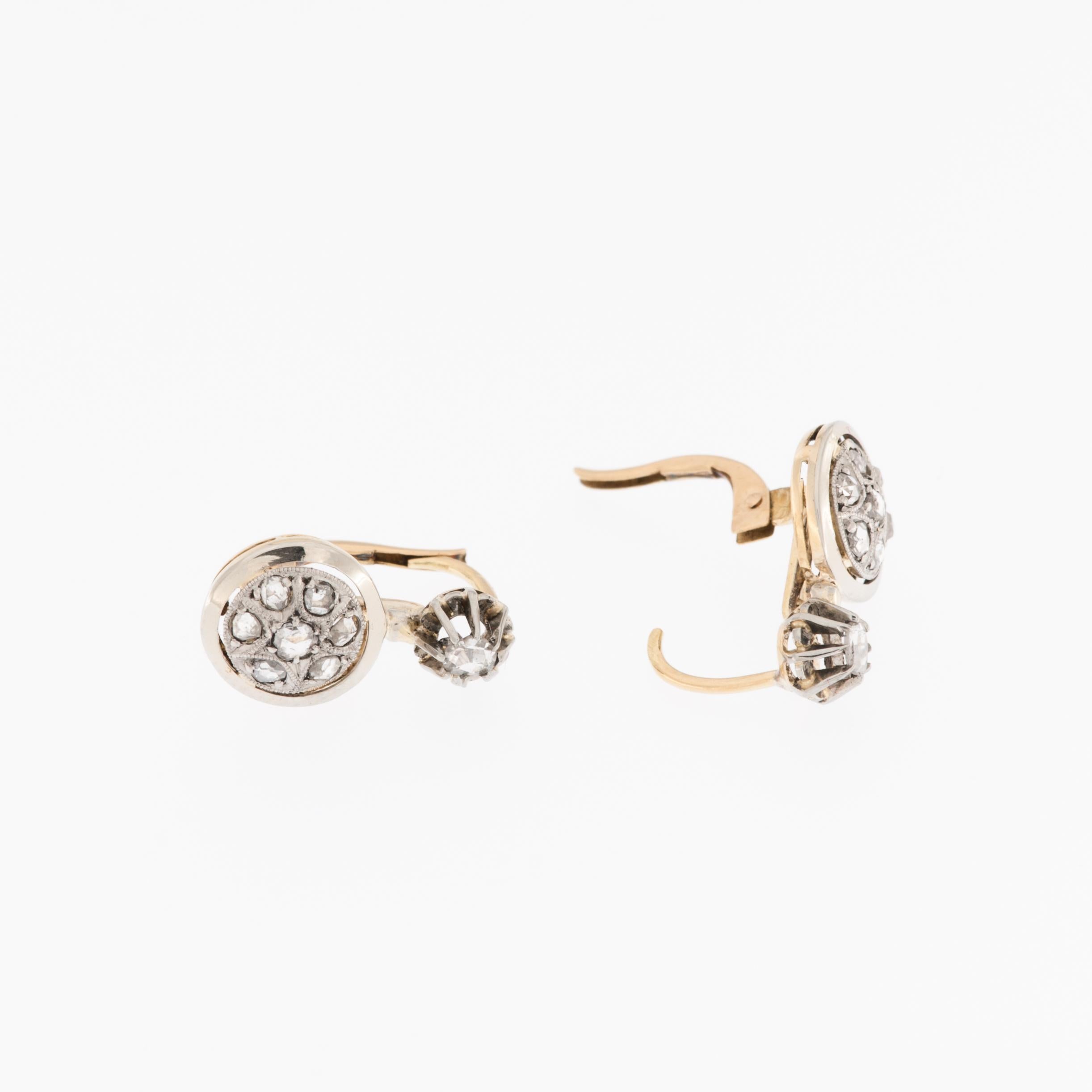 The Art Deco 18kt Gold Earrings with Old-Cut Diamonds are a stunning piece of jewelry that embodies the elegance and sophistication of the Art Deco era. 

The earrings are crafted from 18-karat gold, which is known for its durability and lustrous