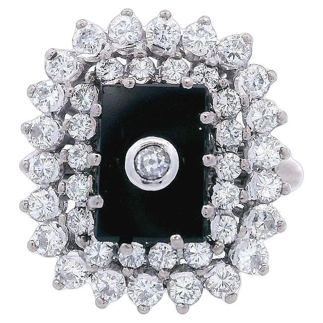 Art Deco Ring aus 18kt Gold mit Diamanten und Onyx