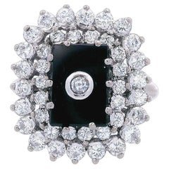 Bague Art déco en or 18 carats avec diamants et onyx