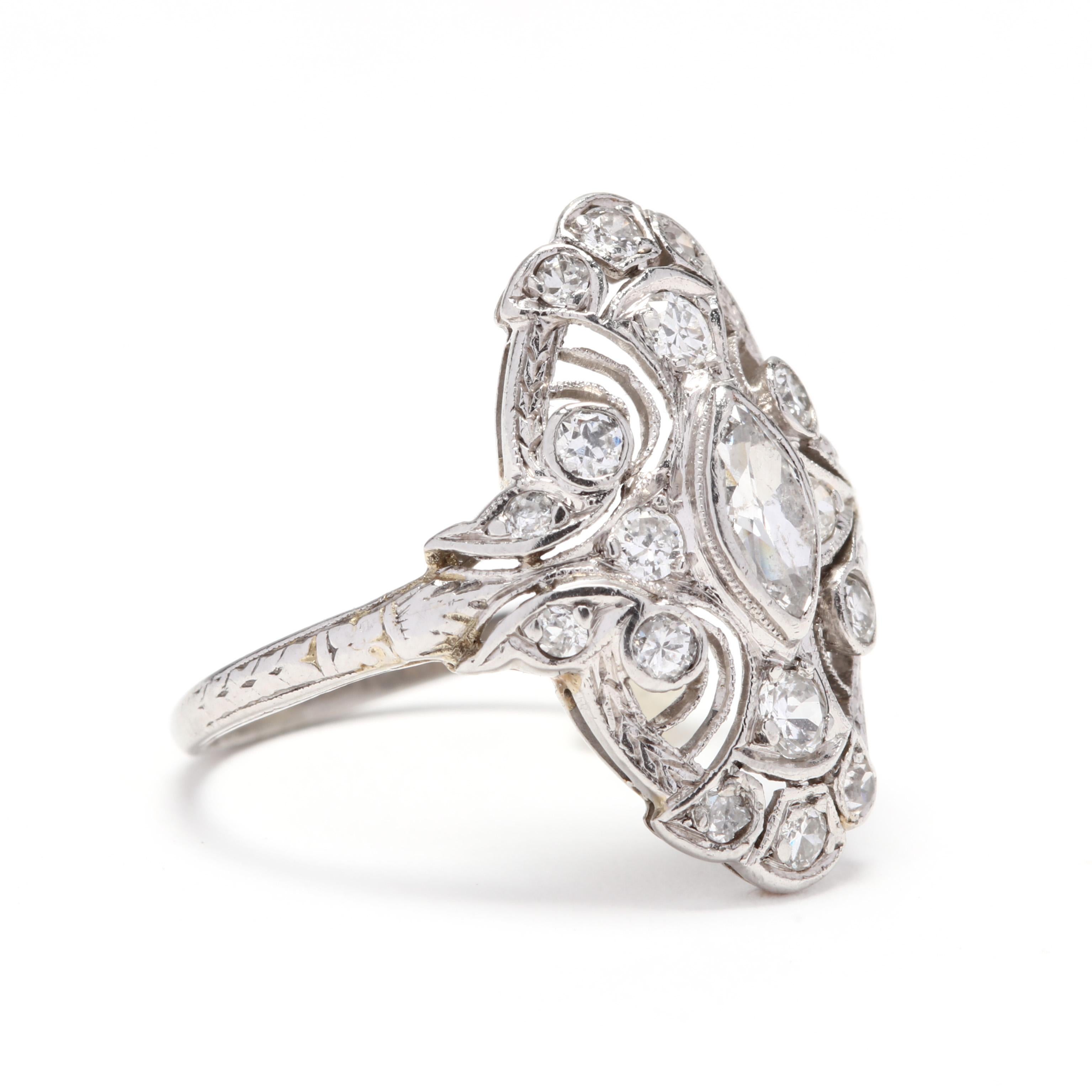 Art Deco 18 karat white gold diamond navette ring. This ring features a marquise center stone with single cut diamond detailing. It is finished with filigree and engraving detail.

Diamonds: approximately .75ctw

2.62 dwts

Size 6.75

* Please note