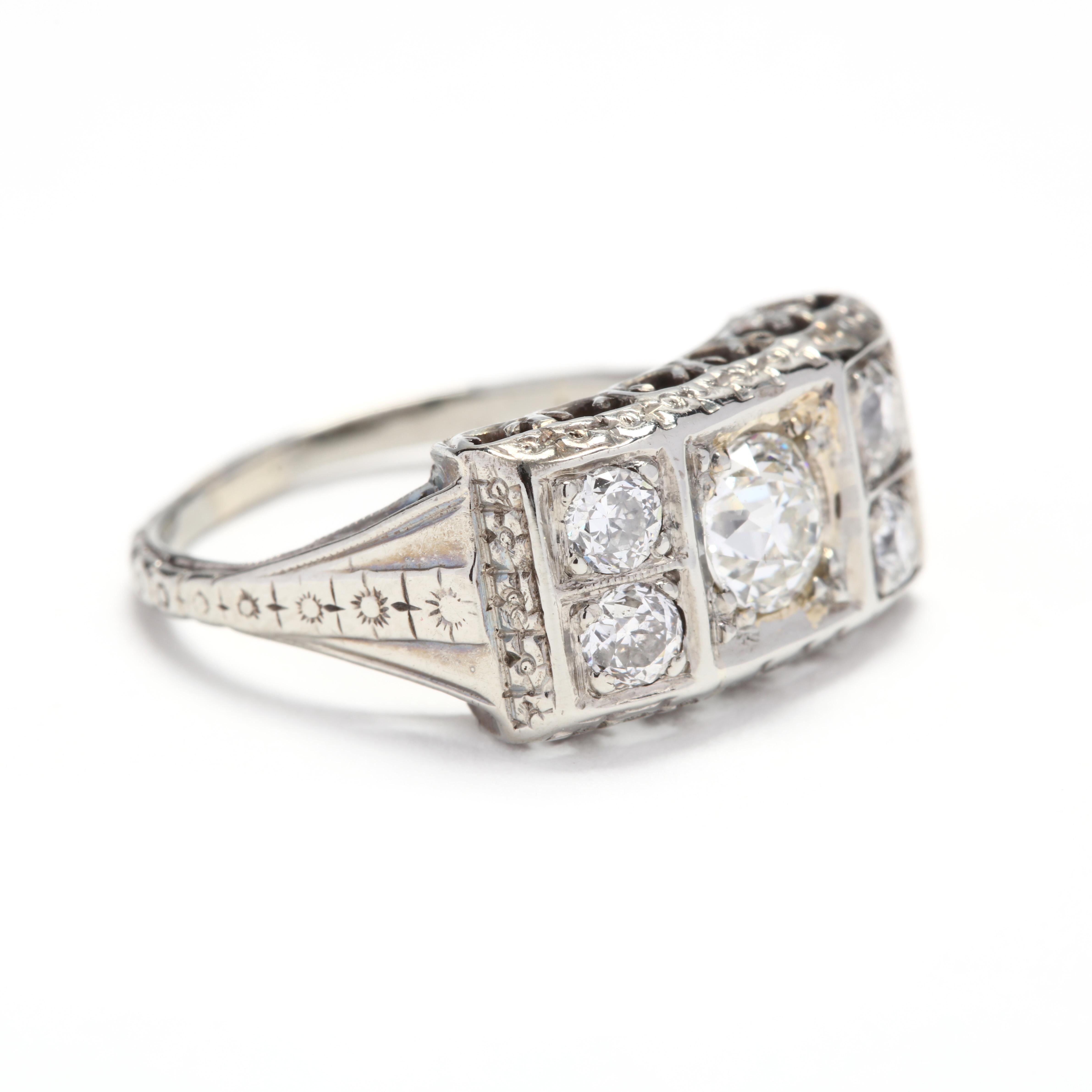 Art Deco 18 karat white gold horizontal, rectangular ring with a bead set old european cut diamond center stone weighing .54 carat, with two old european cut diamonds on either side and orange blossom floral engraving.



Center Diamond

- old