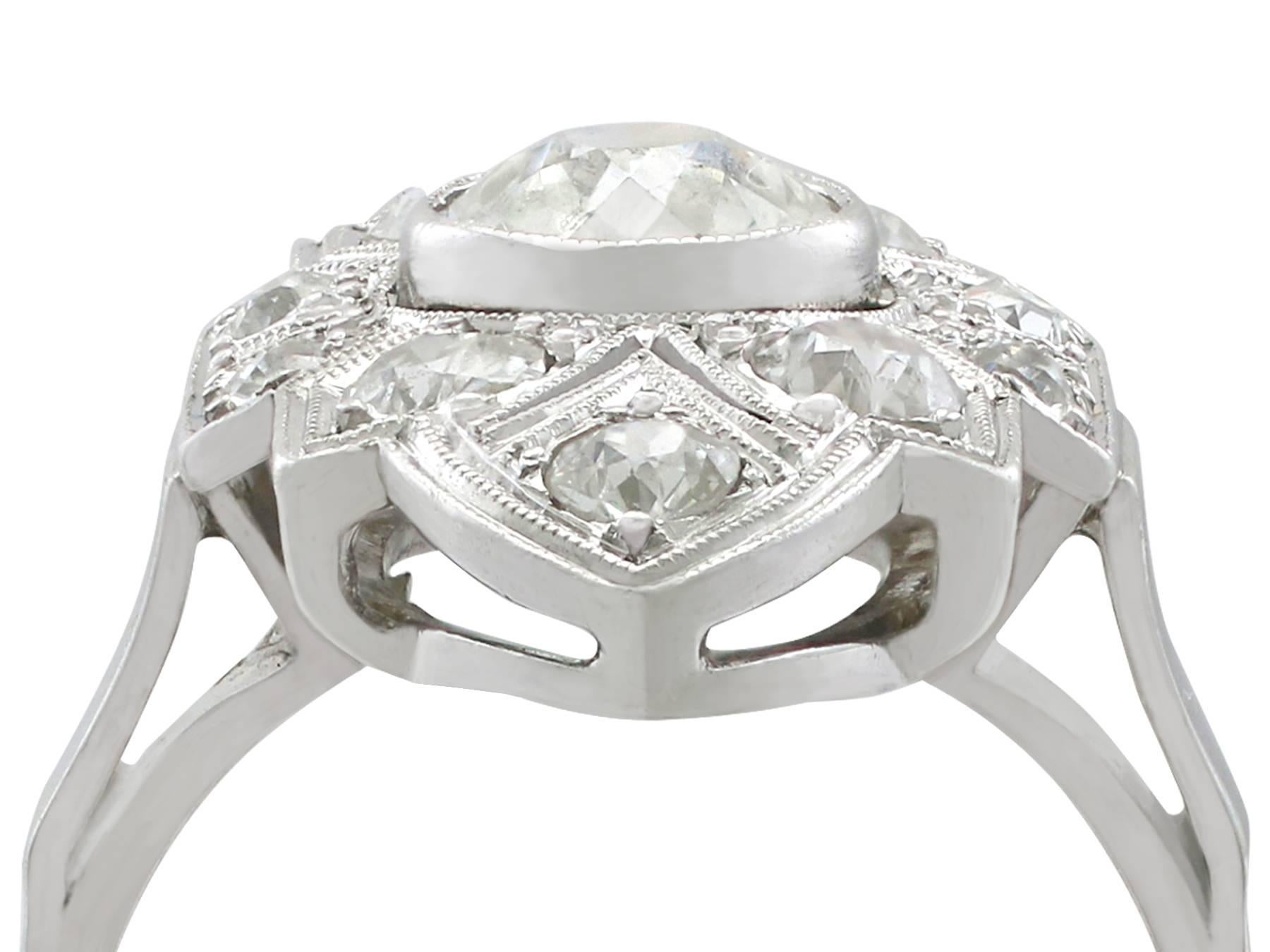 An impressive vintage Art Deco 1.91 Ct diamond and 14k white gold, platinum set marquise shaped dress ring; part of our diverse diamond jewelry collections.

This fine and impressive Art Deco white gold and diamond ring has been crafted in 14 Ct