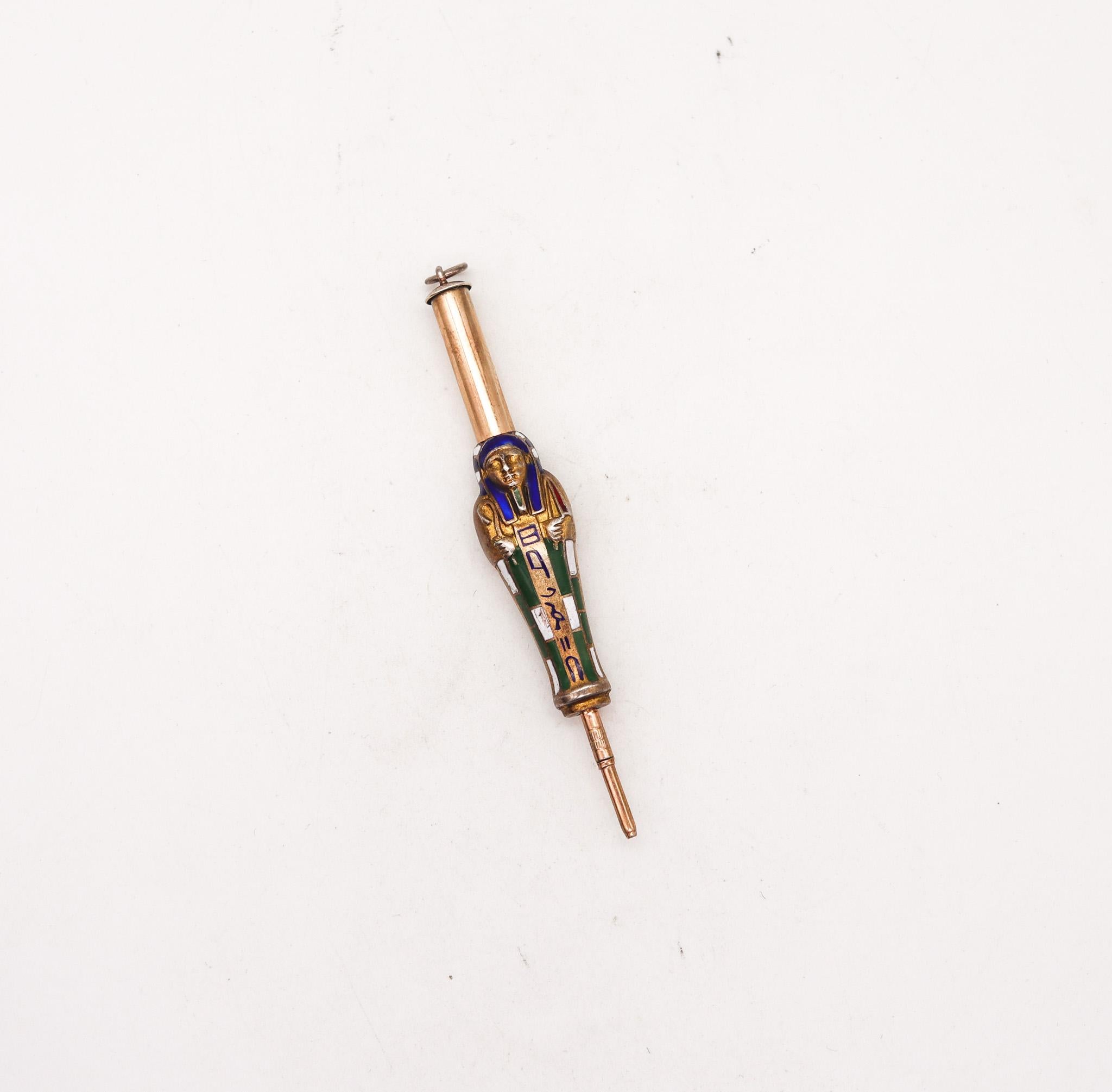 Egyptian revival Pharaoh sarcophagus pencil designed by Hans Aigner.

Fantastic miniature pendant-pencil, created at the silversmith atelier of Hans Aigner in Vienna Austria during the art deco period, back in the 1913-1920. This beautiful