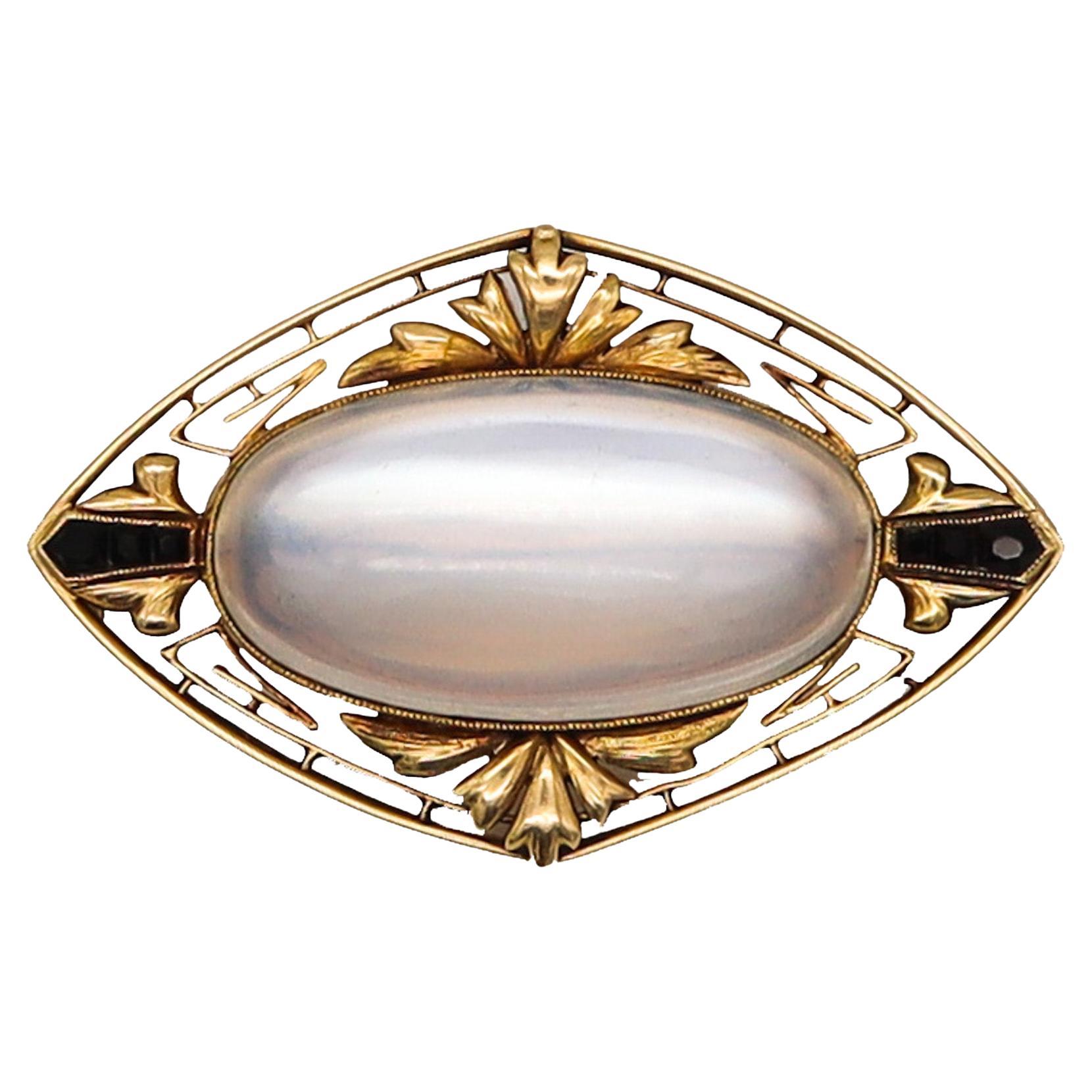 Art deco convertible pendant with moonstone.

A statement beautiful antique piece, created during the art deco period, back in the early 1920's. It was carefully designed with a hint of art nouveau organic patterns and with art deco geometrical