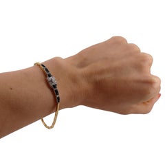 Art Deco 1920 Bracelet in 18kt Yellow Gold with Diamonds and Onyx