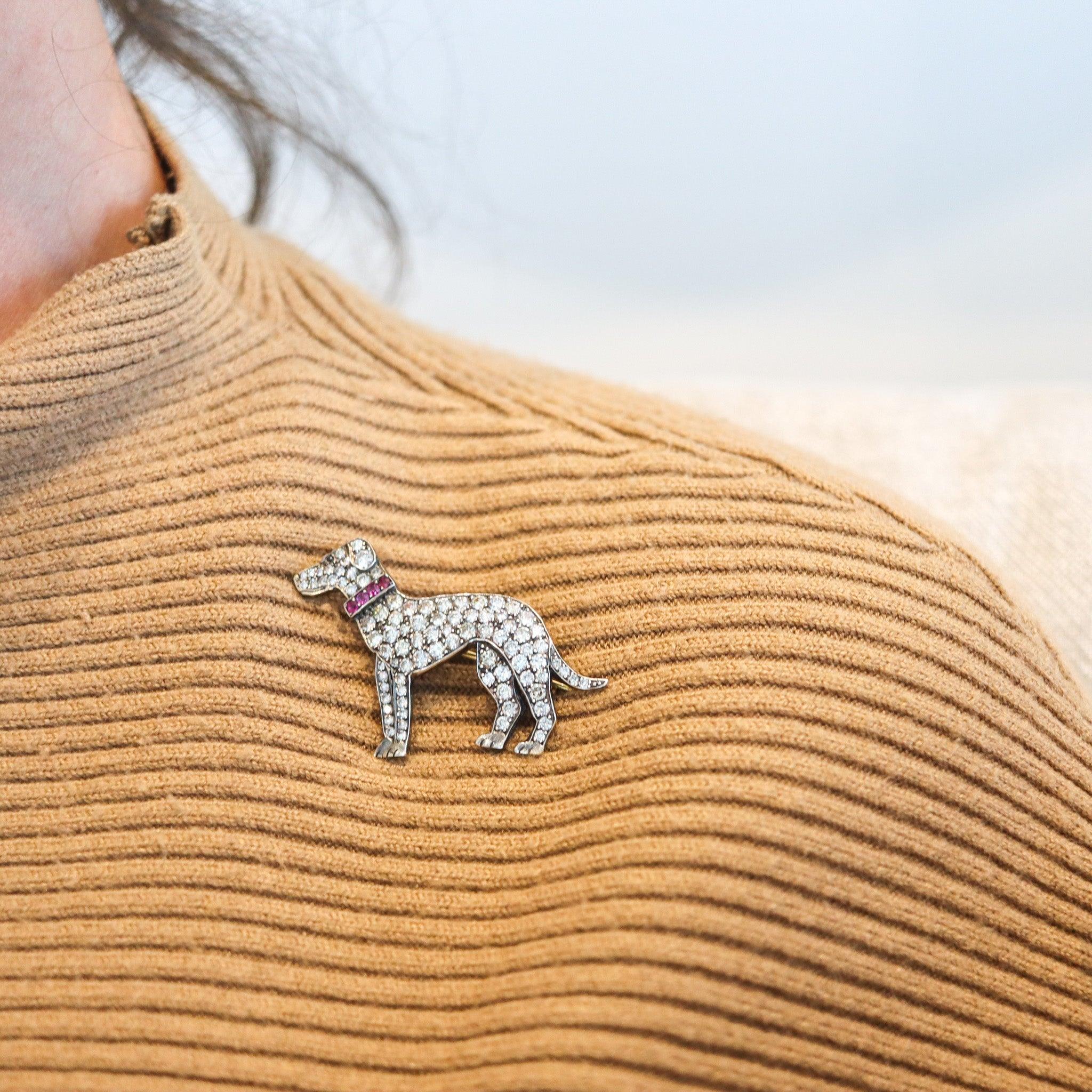 An art-deco European dog brooch with diamonds.

This is a beautiful antique brooch created in Europe during the art deco period, back in the 1915-1920. The fabulous brooch has been designed in the shape of a stylized dog, masterfully crafted in