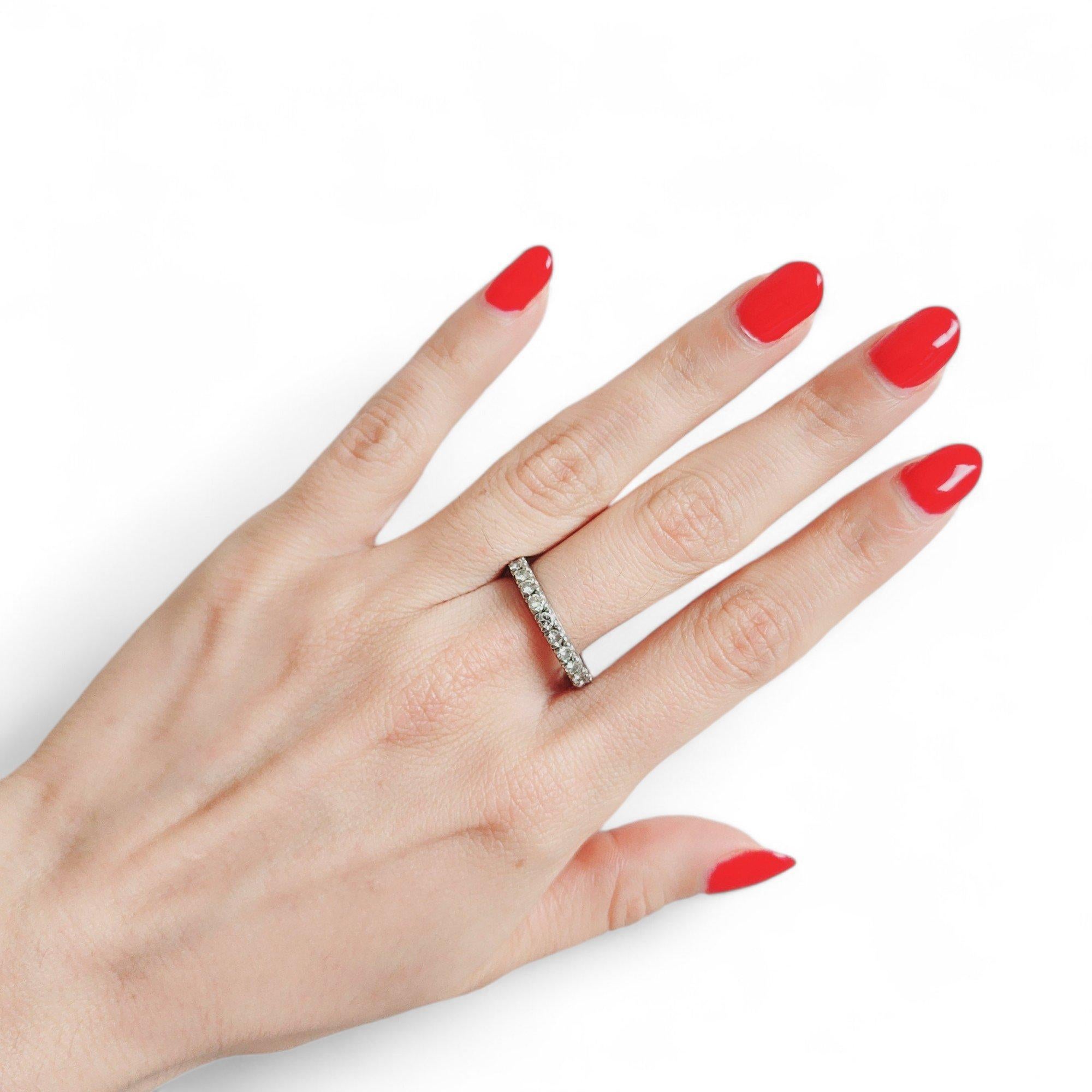 Nice Art Deco Eternity Band crafted in Platinum, set with 24 round cut Diamonds Approximately 1.20 carats. 

Step into the world of timeless glamour with this exquisite Art Deco Eternity Band, expertly crafted in lustrous platinum. A true testament