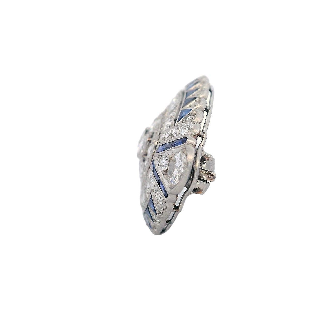 Women's or Men's Art Deco 1920 platinum filigree Brooch with Diamonds and Sapphires For Sale