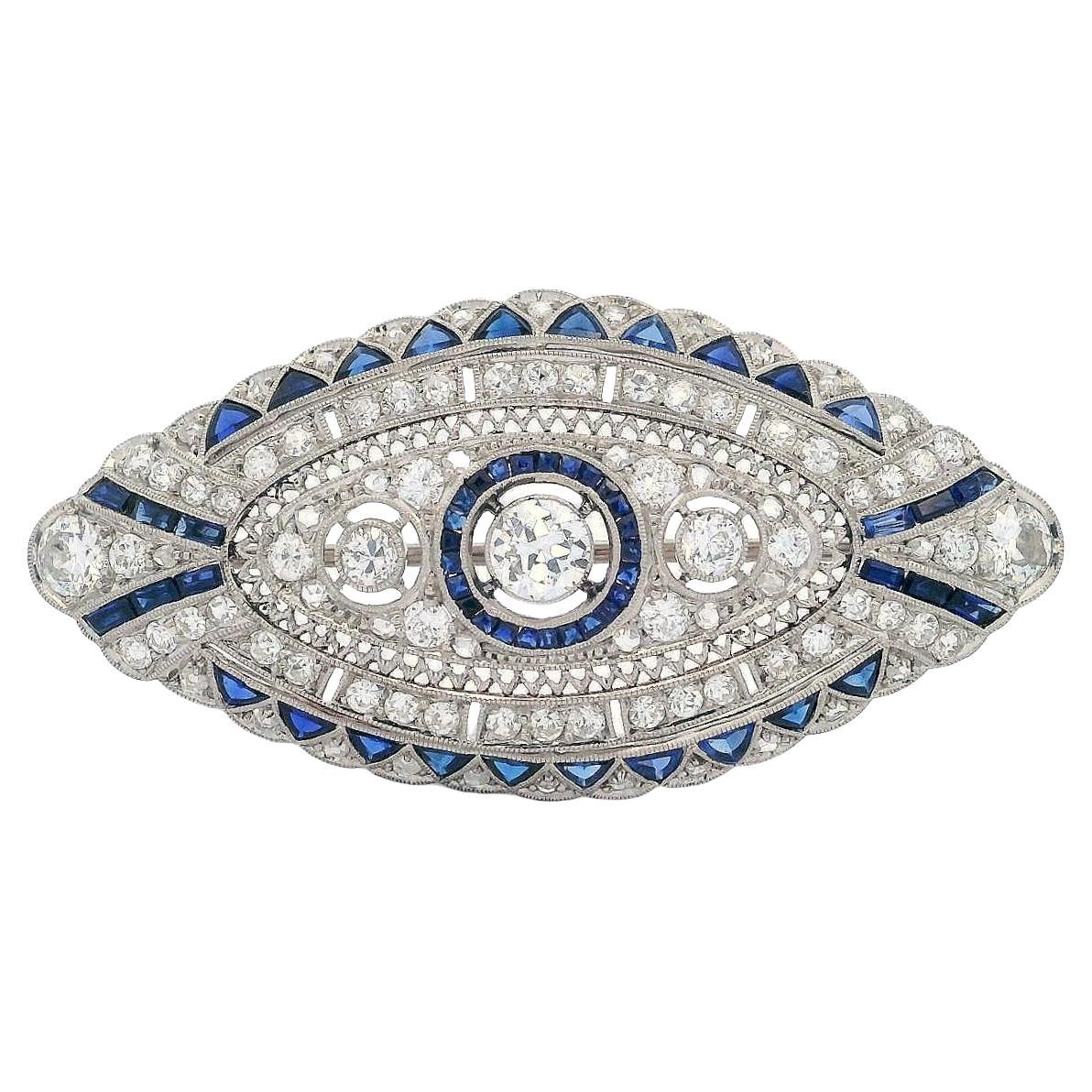 Art Deco 1920 platinum filigree Brooch with Diamonds and Sapphires