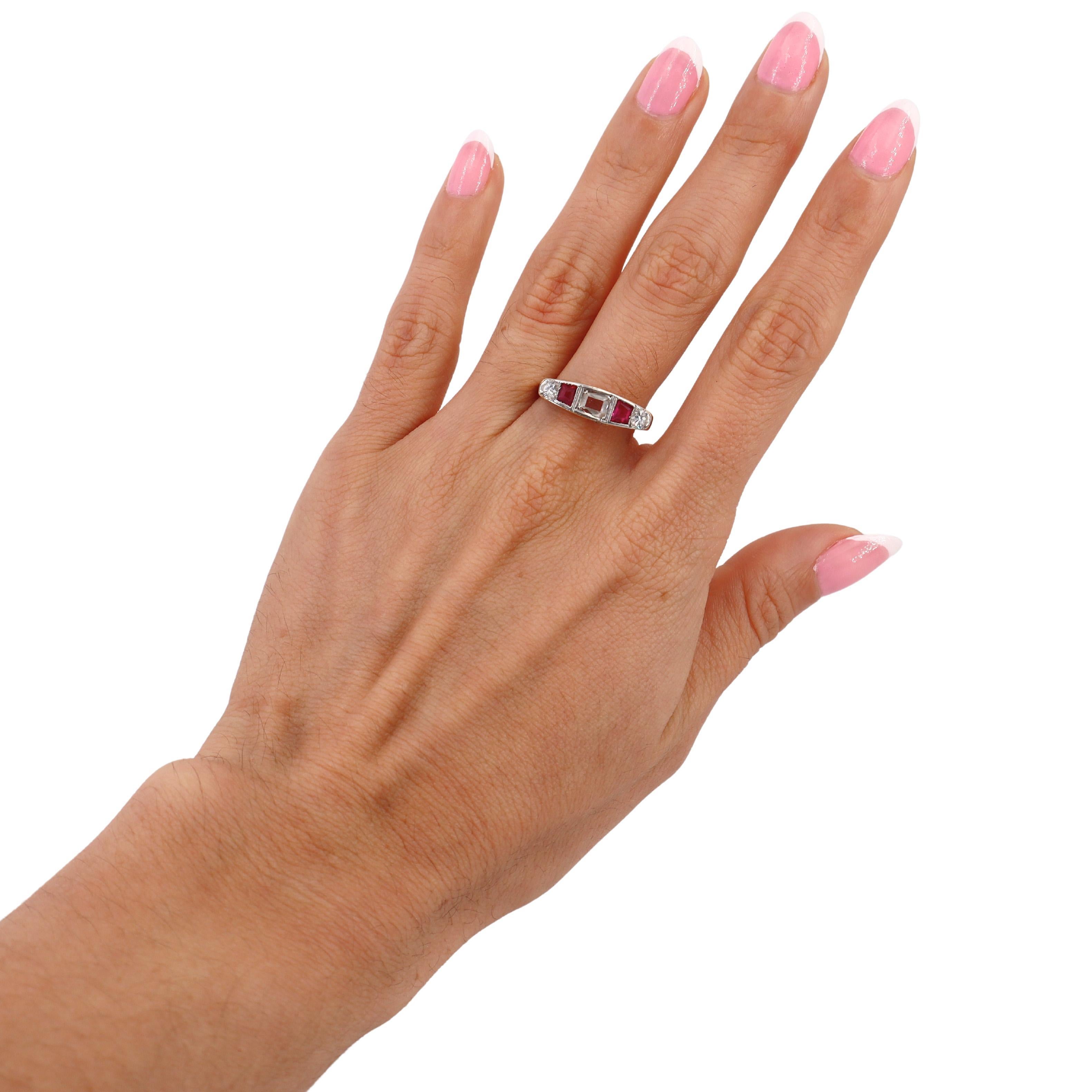 This exquisite Art Deco ring showcases the timeless elegance of the 1920s-1930s. Crafted in 18kt yellow gold with a platinum top, it features the characteristic milgrain finish, emphasizing the geometric and intricate design that defines the Art