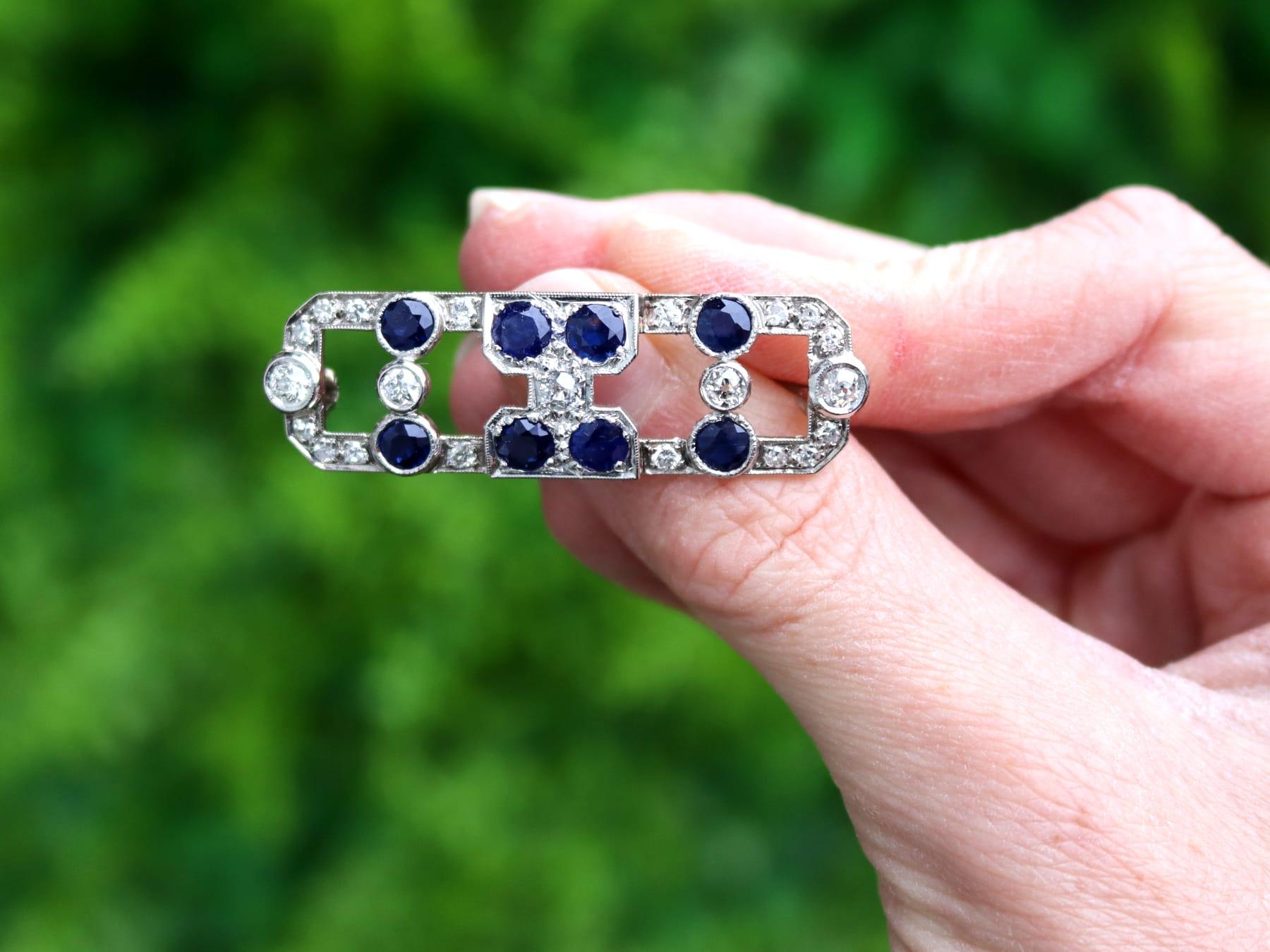A fine and impressive antique Art Deco 1.70 carat diamond and 3.20 carat sapphire, 15k white gold and platinum set brooch; part of our diverse antique jewelry and estate jewelry collections.

This stunning, fine and impressive antique brooch has
