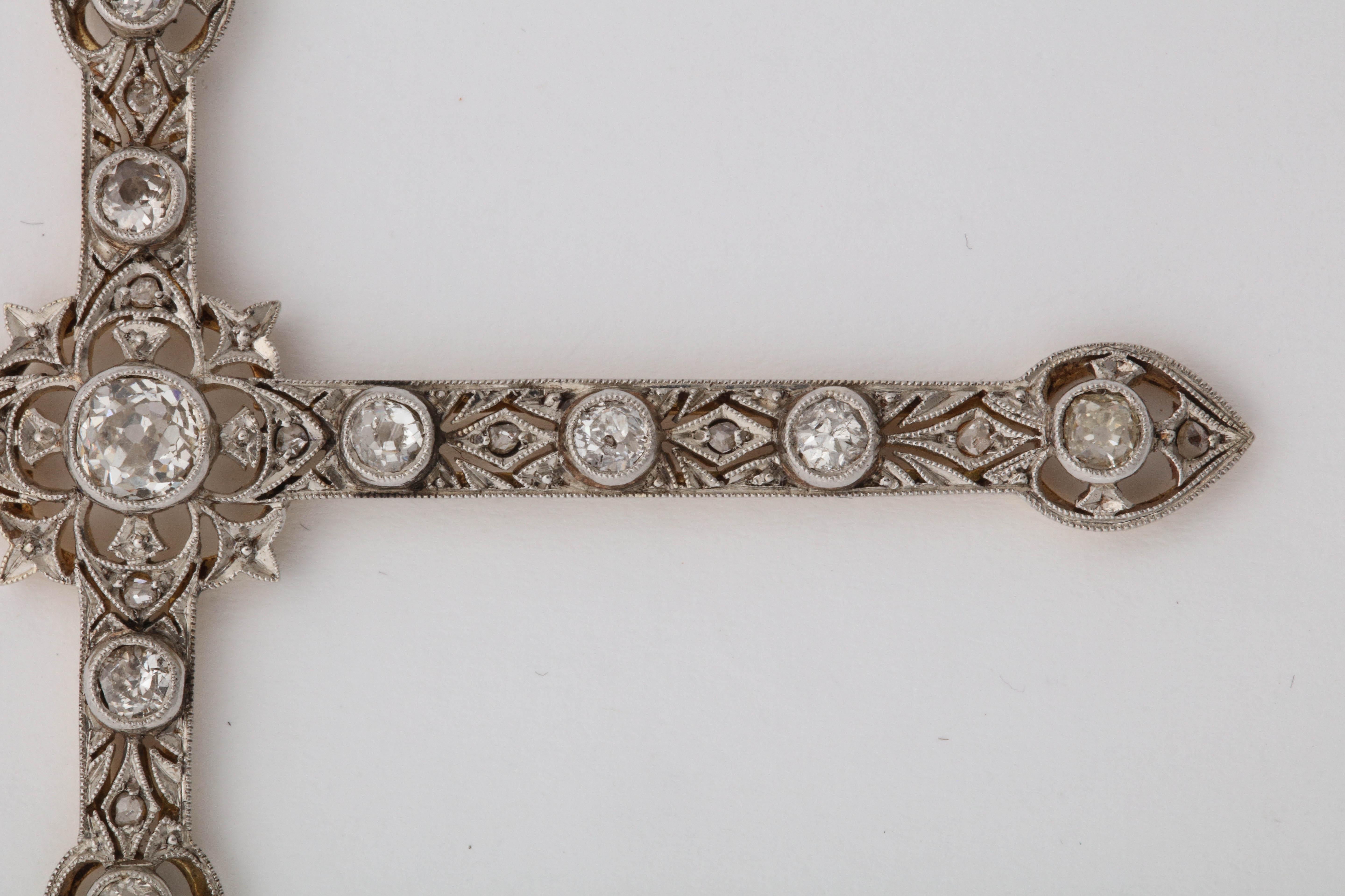 Round Cut Art Deco 1920s Diamond with Open Pierced Workmanship Gold and Platinum Cross For Sale