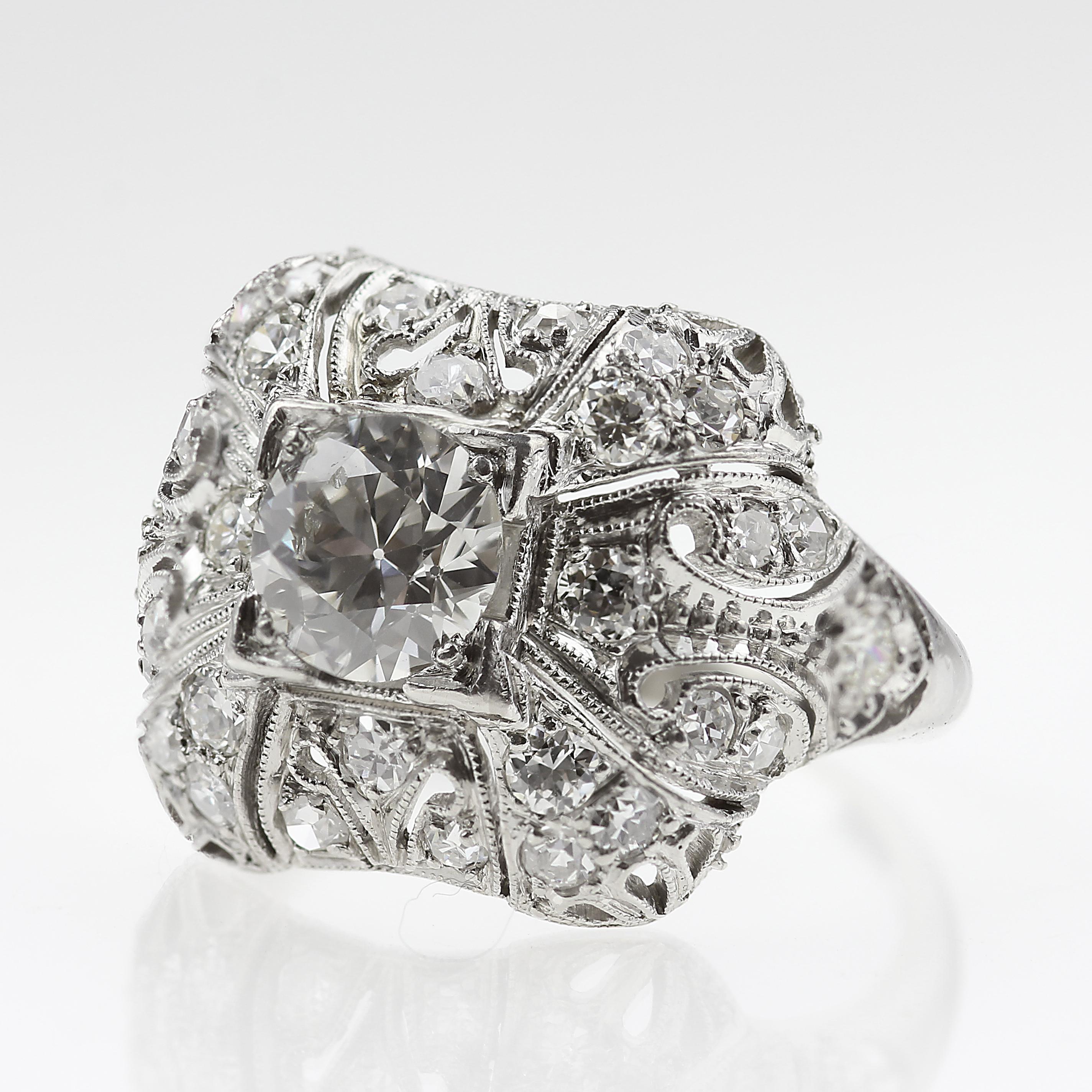 A beautiful old cut, diamond ring. Not your modern everyday ring, but this is a 1920’s-which was a time of spending money, parties and living your best life, vintage ring. The ring itself is made with platinum and glittering diamonds encased on top,