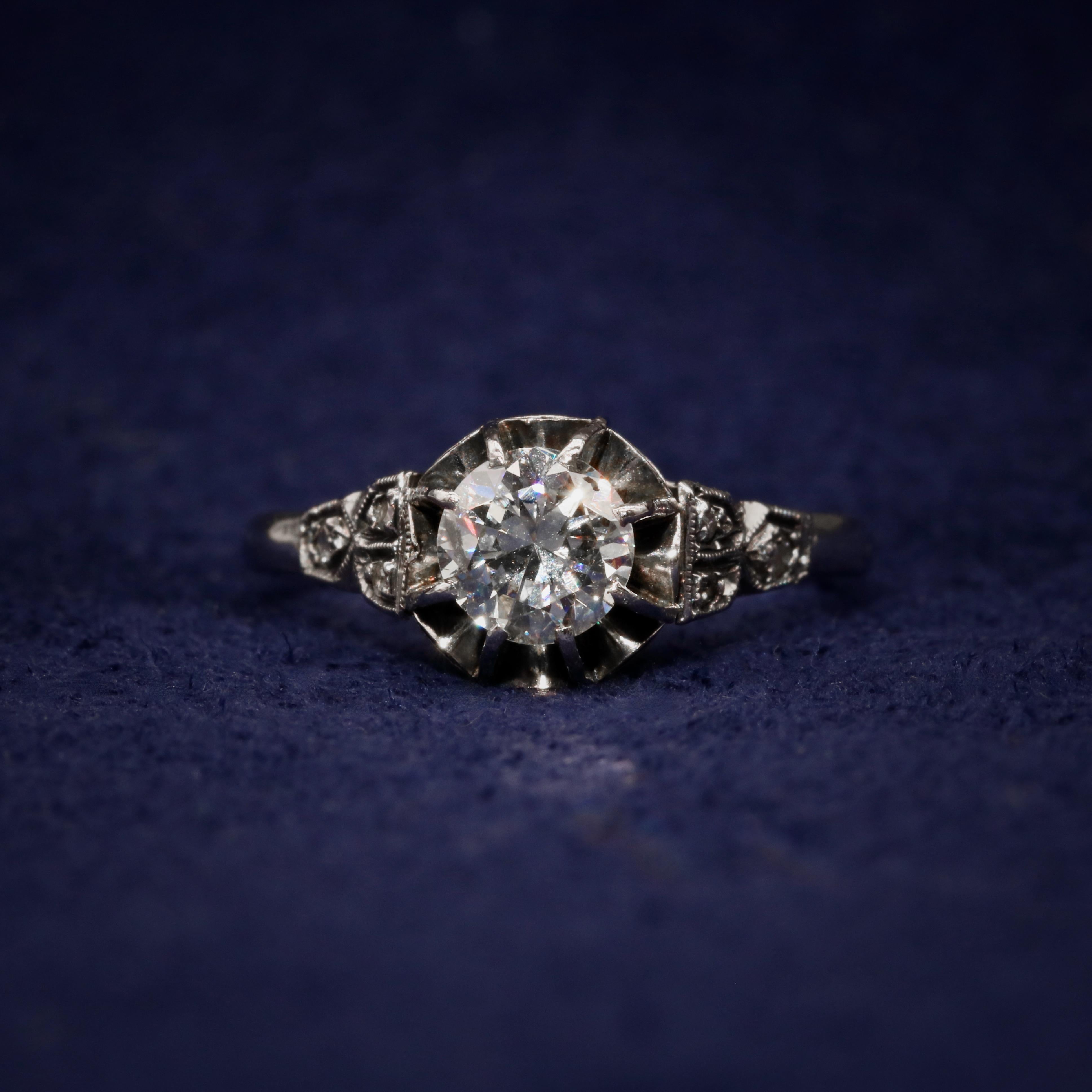 Brilliant Cut Art Deco 1920s Platinum 0.78ctw Diamond Solitaire Ring with Diamond Shoulders For Sale