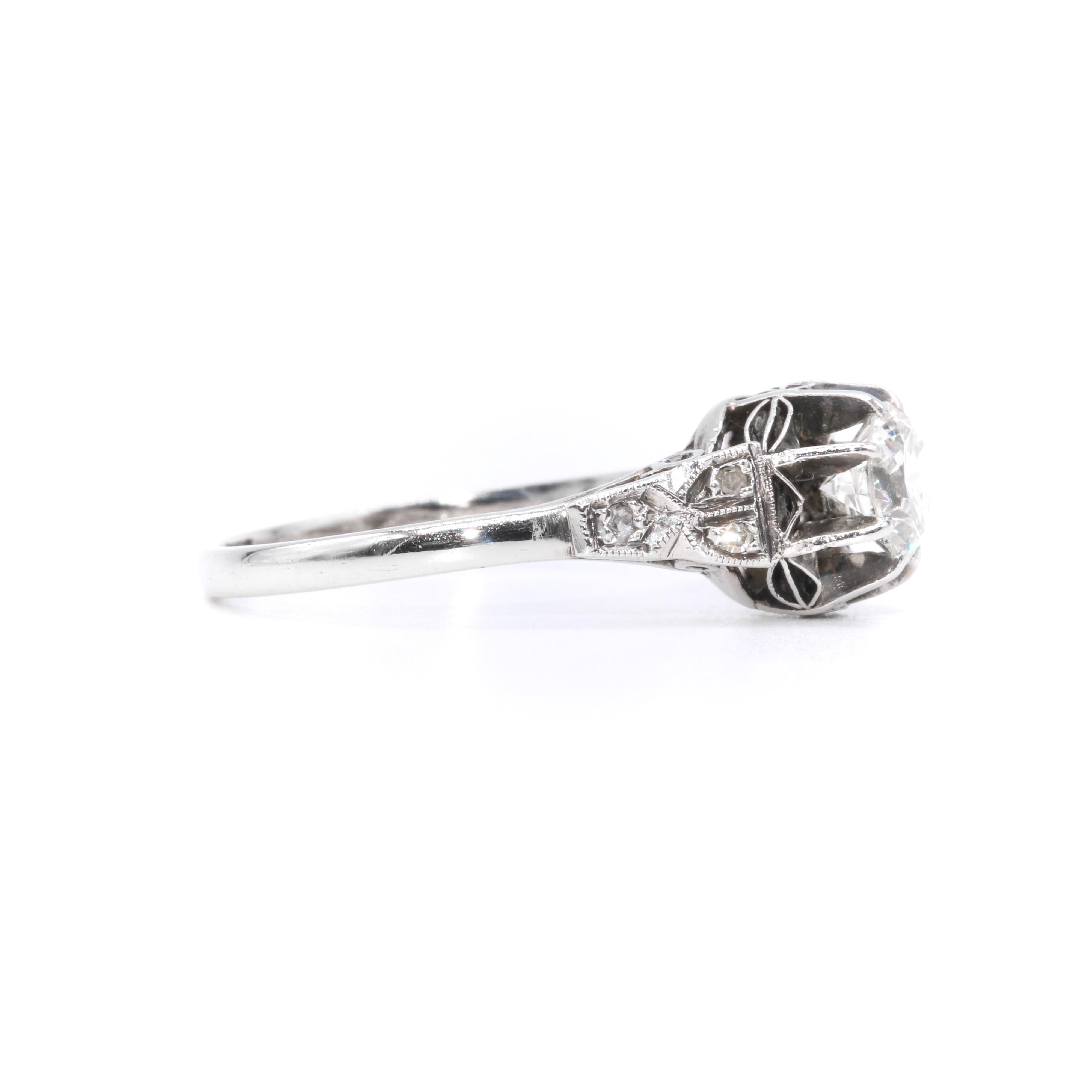 Art Deco 1920s Platinum 0.78ctw Diamond Solitaire Ring with Diamond Shoulders For Sale 1