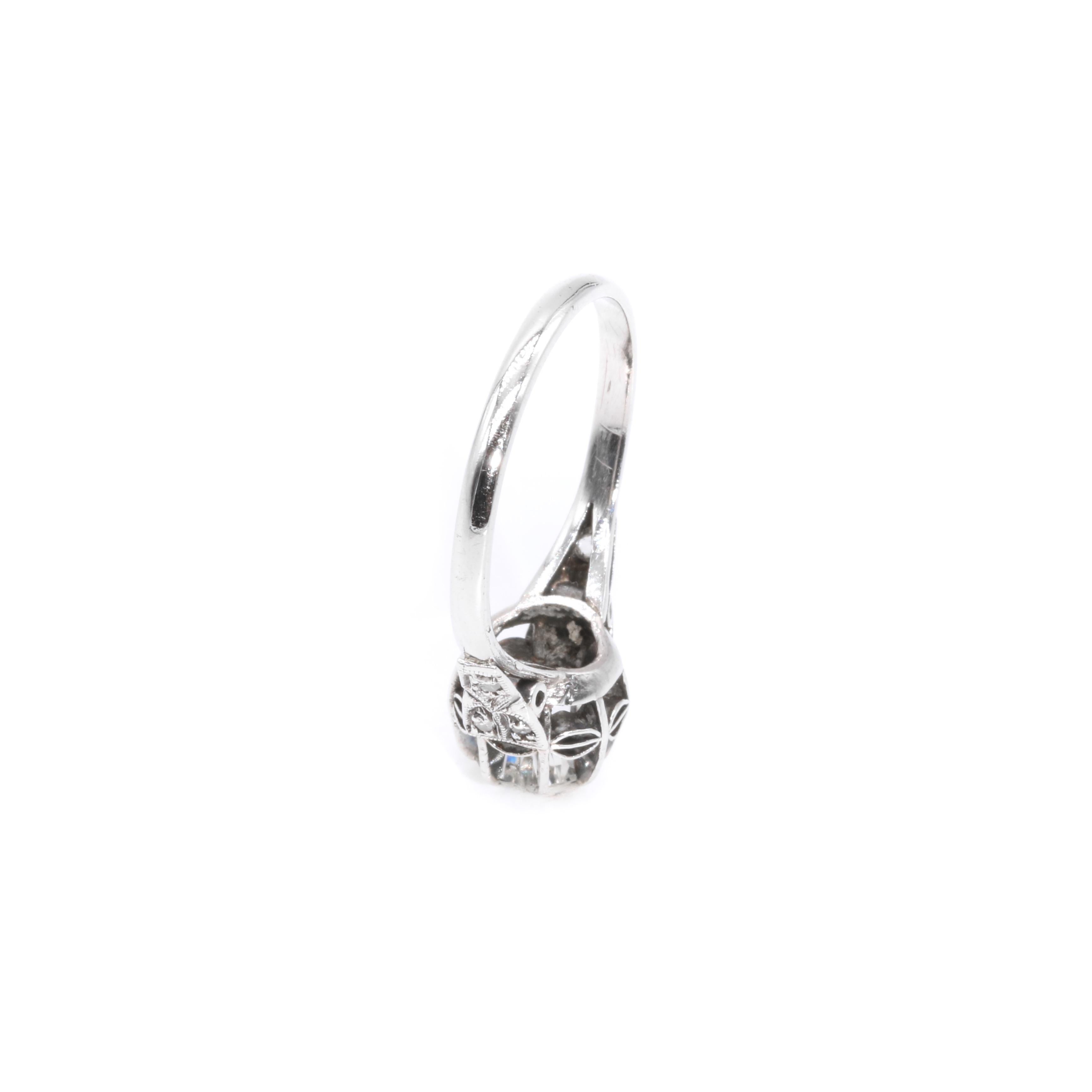 Art Deco 1920s Platinum 0.78ctw Diamond Solitaire Ring with Diamond Shoulders For Sale 4