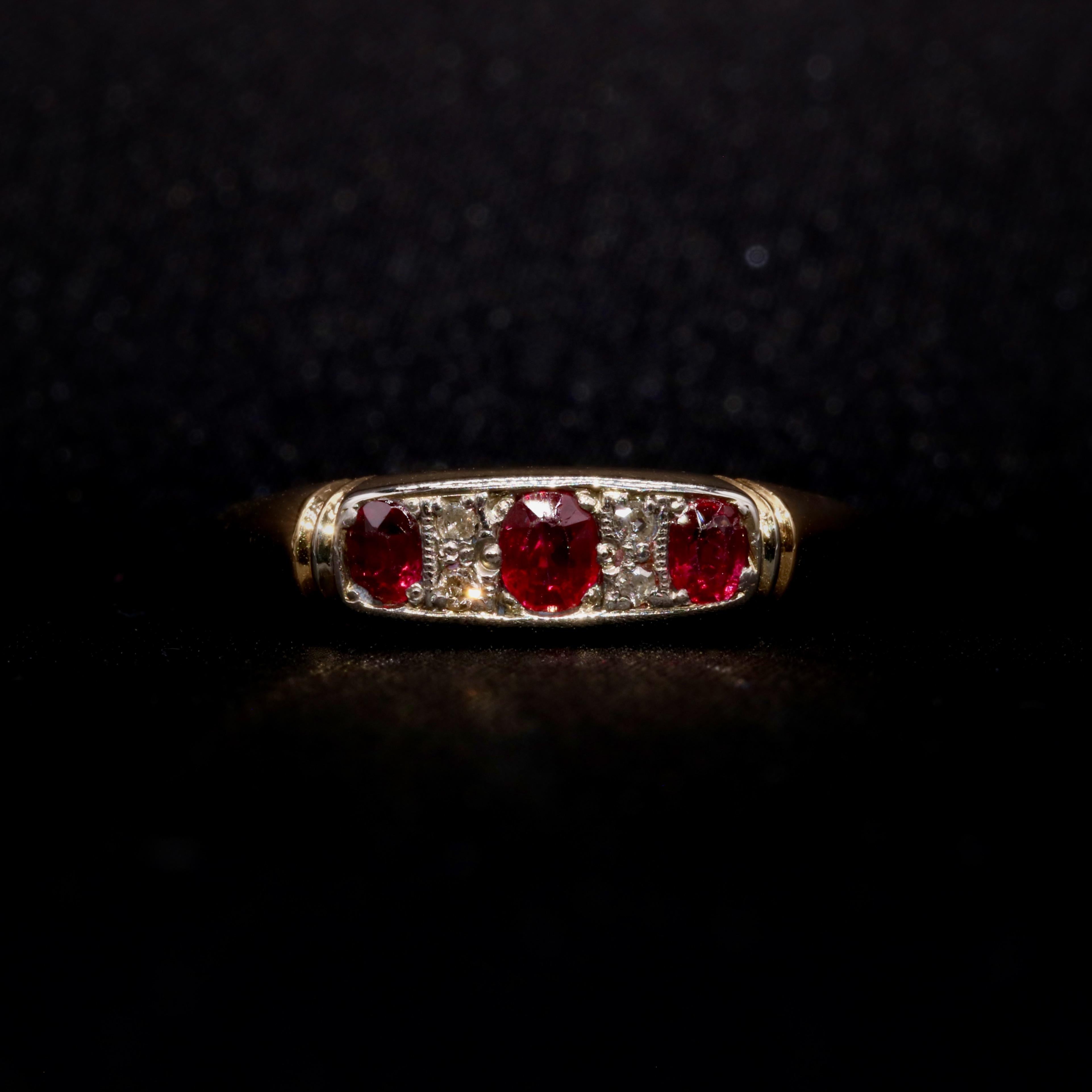 Oval Cut Art Deco 1920s Platinum and 18K Yellow Gold Ruby and Diamond 7 Stone Ring For Sale