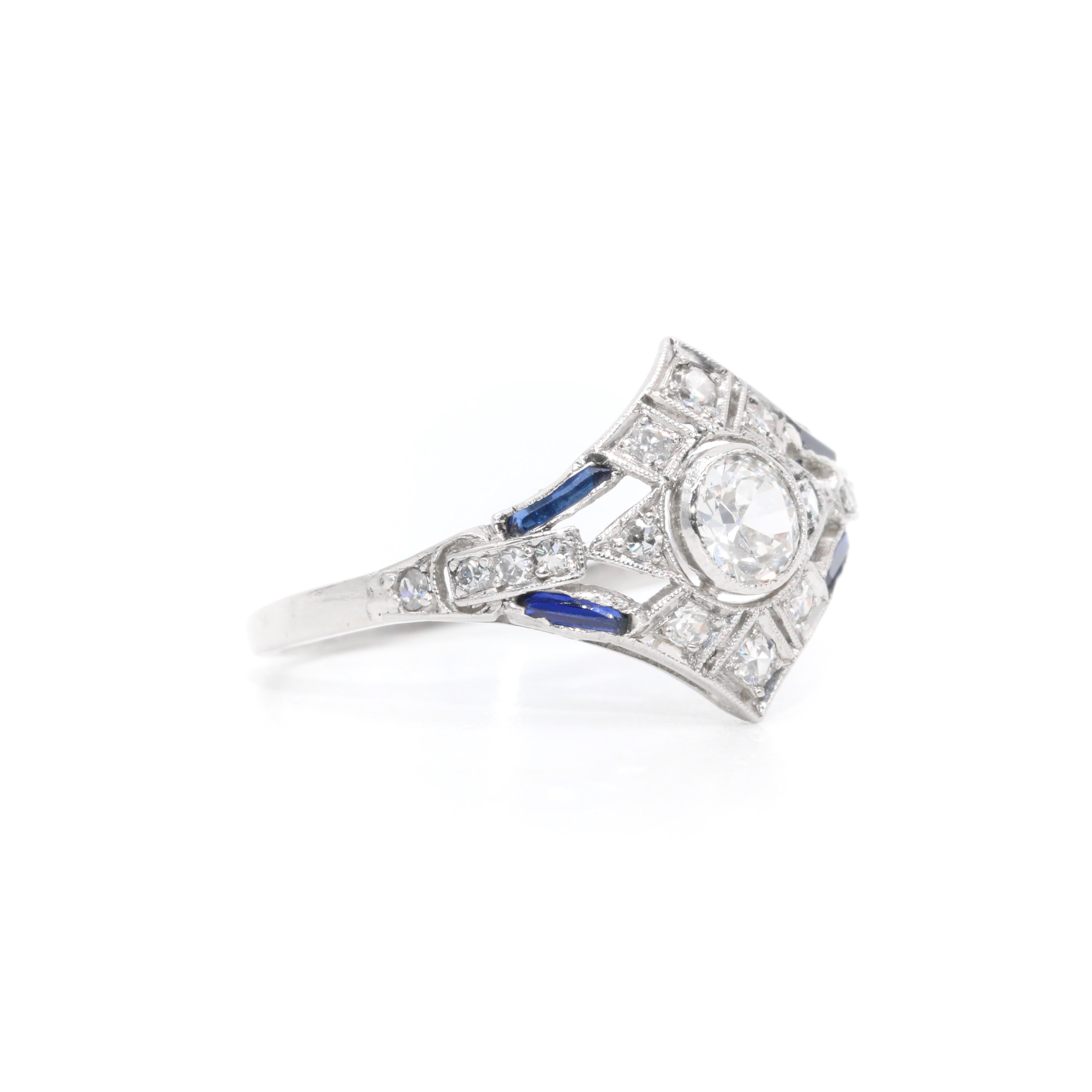 Women's or Men's Art Deco 1920s Platinum Old Cut Diamond and Sapphire Openwork Panel Ring For Sale