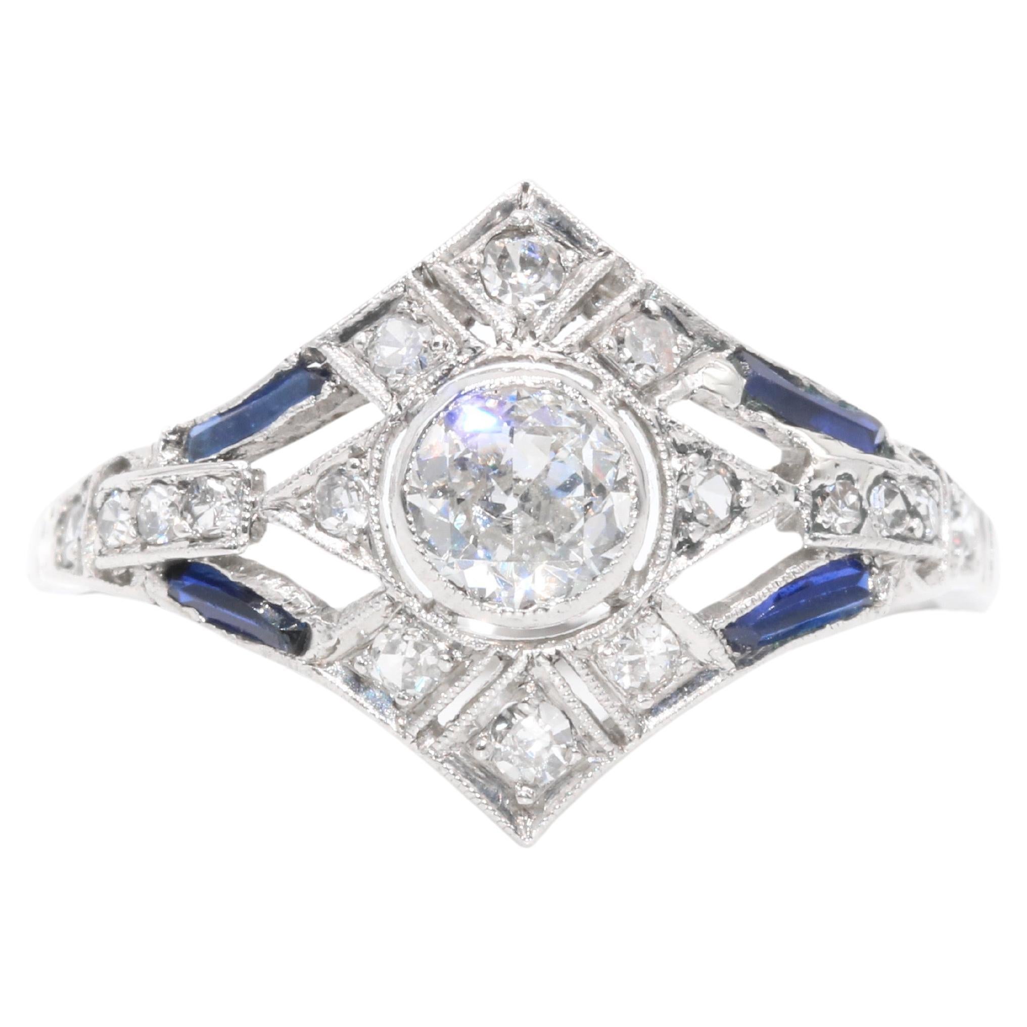 Art Deco 1920s Platinum Old Cut Diamond and Sapphire Openwork Panel Ring