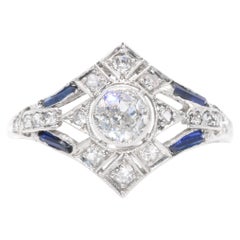 Art Deco 1920s Platinum Old Cut Diamond and Sapphire Openwork Panel Ring