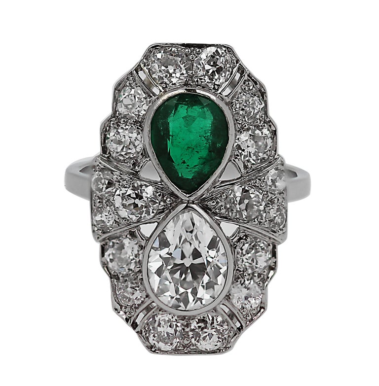 Art Deco 1920s Pear Shape Diamond and Emerald Platinum Ring For Sale at