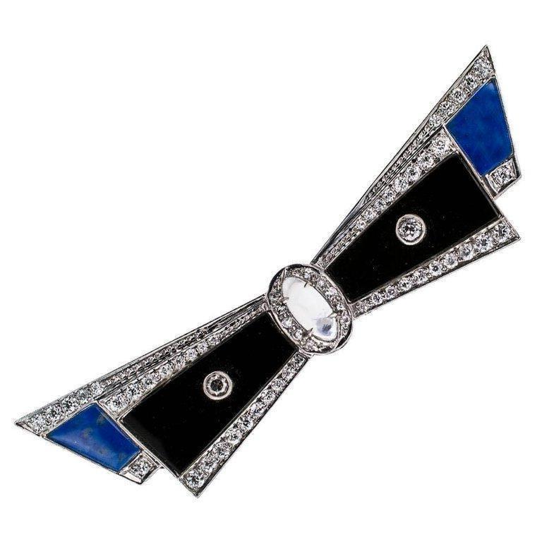 Art Deco 1925 Bow Brooch Diamond Lapis Moonstone Onyx Platinum In Excellent Condition In Los Angeles, CA