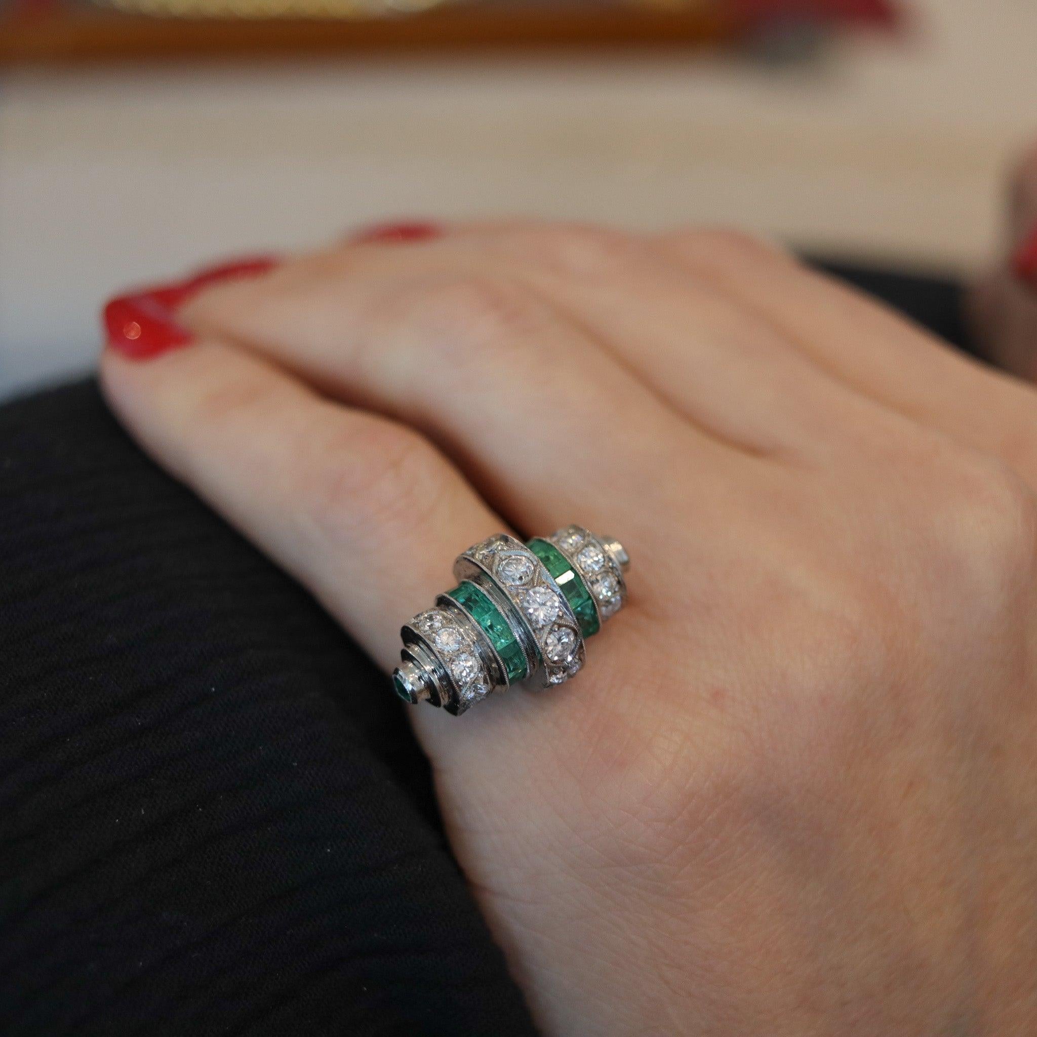 An art deco platinum cocktail ring.

This is a fantastic antique cocktail ring, created in America during the art deco period, back in the 1925. The beautiful ring was masterfully crafted in solid platinum and mount with a great selection of