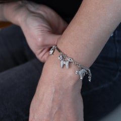 ART DECO 1925 Five Dogs Charms Bracelet In Platinum With 4.03 Ctw Diamonds
