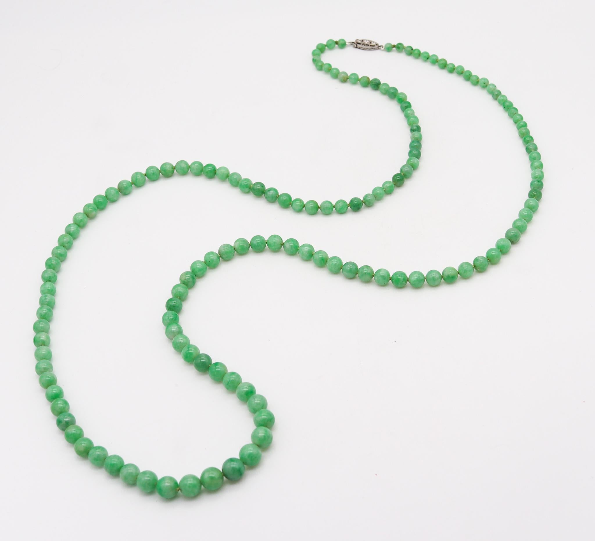 An art deco graduated jadeite beads necklace.

Fabulous long necklace sautoir type, created during the Art Deco period, circa 1925. It is composed by multiples graduated spheres beads of Burmese jadeite jade with the original platinum security box