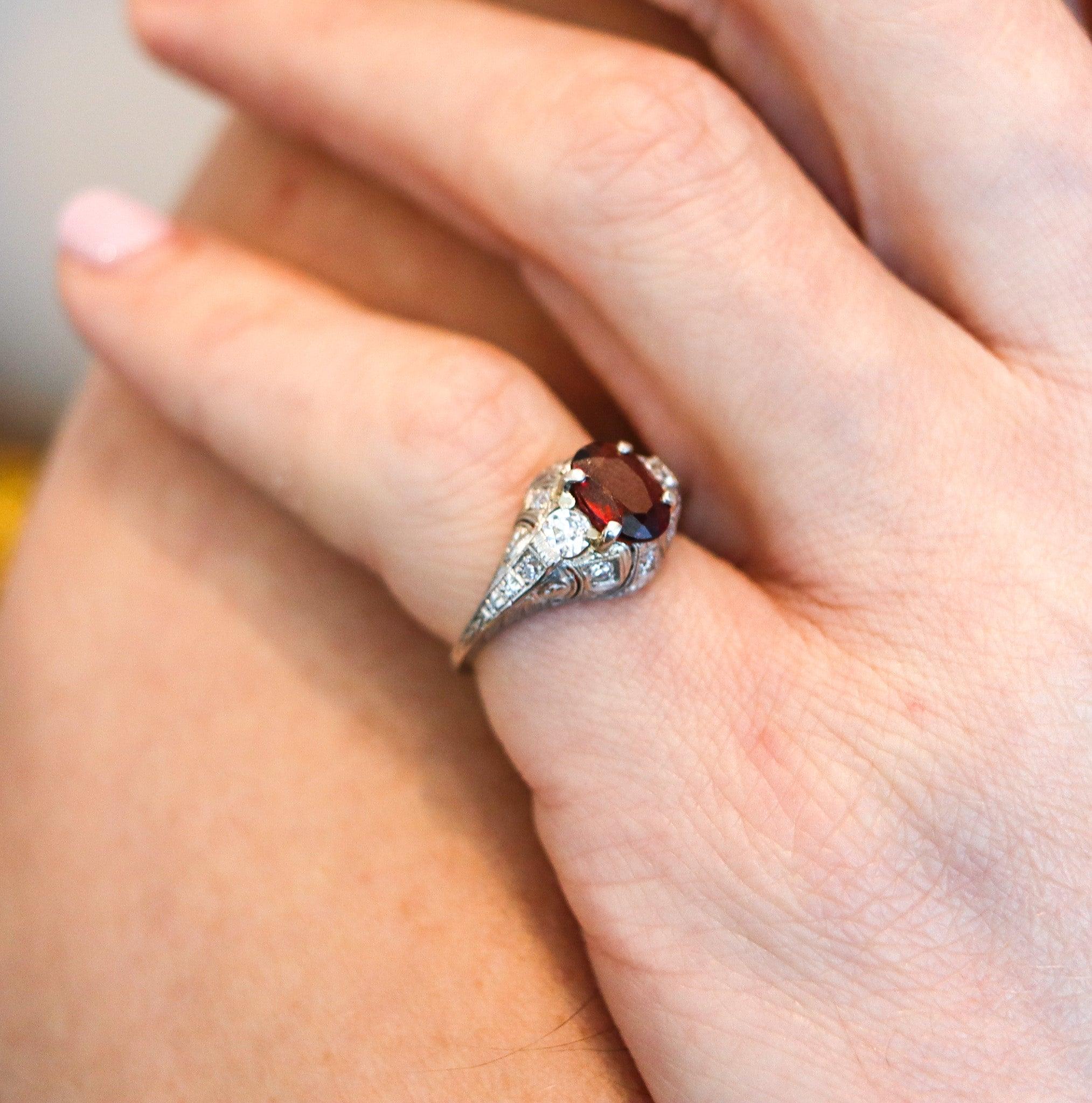 An art Deco Gem Set Ring.

This is a beautiful and elegant ring, created during the American art Deco period, back in 1925. The ring has been carefully crafted in solid .900/.999 platinum and embellished with a great selection of eleven natural