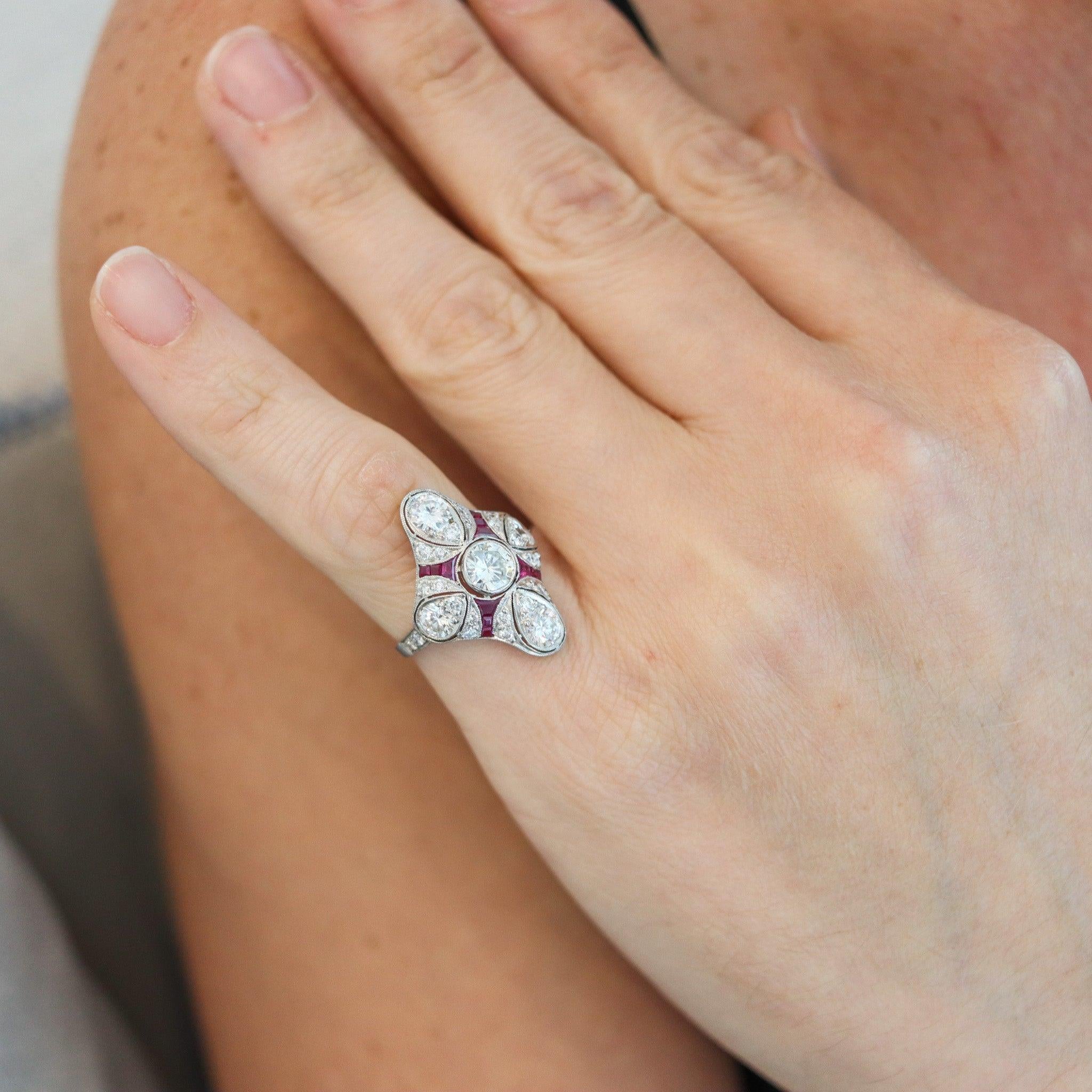 An art deco quadriform ring with rubies.

Stupendous antique cocktail ring, created in America during the art deco period, back in the 1930. The beautiful ring clearly scream art deco and was crafted in solid platinum with high polished finish. The