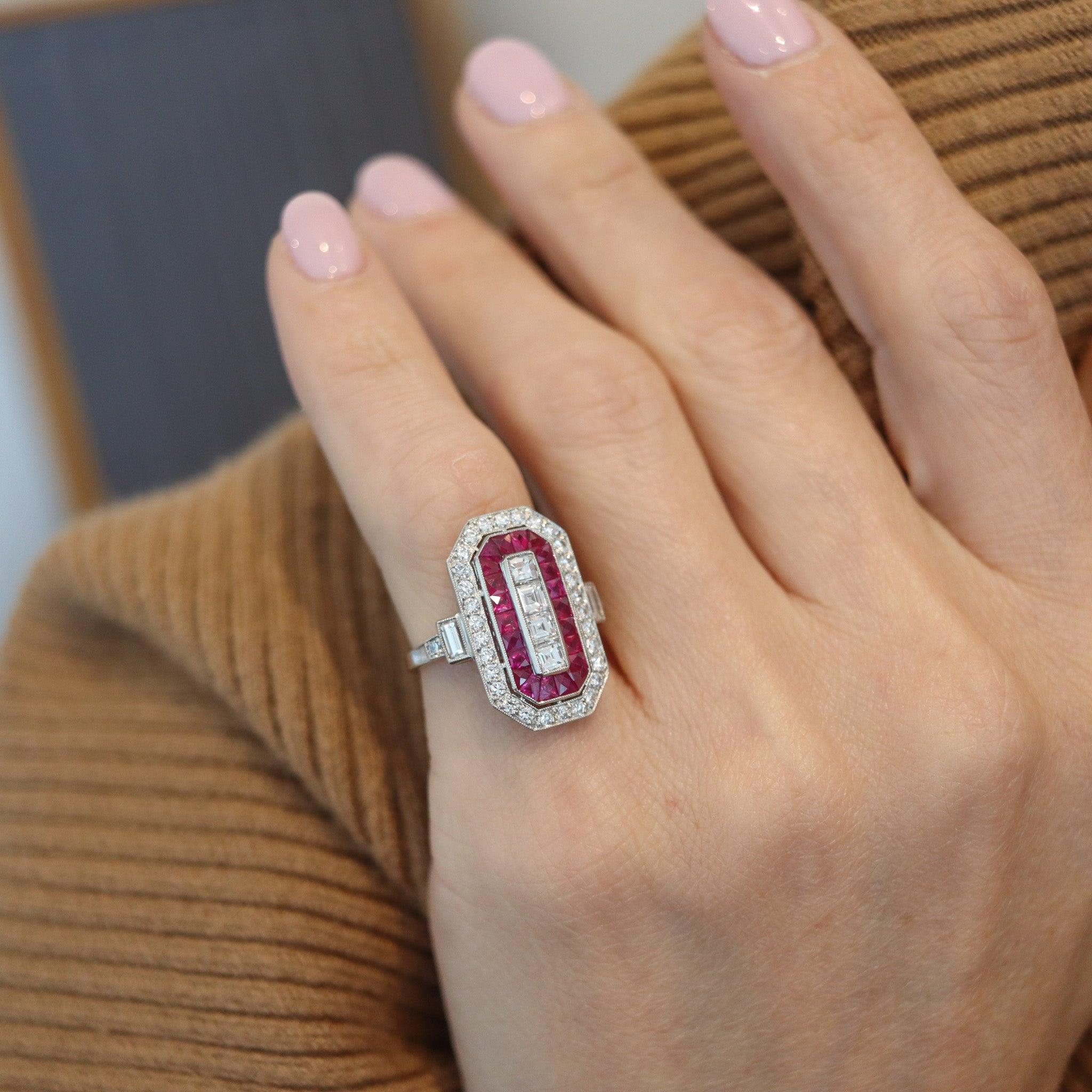 An American art deco ring with rubies.

This beautiful antique cocktail ring was created in America during the art deco period, back in the 1930. The ring is gorgeous and clearly scream art deco. It was carefully crafted with rectangular shape in