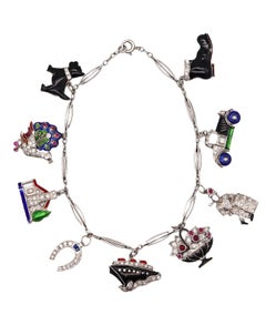 Art Deco 1930 Eight Charms Bracelet In Platinum Enamel With 2.78 Ctw In Diamonds