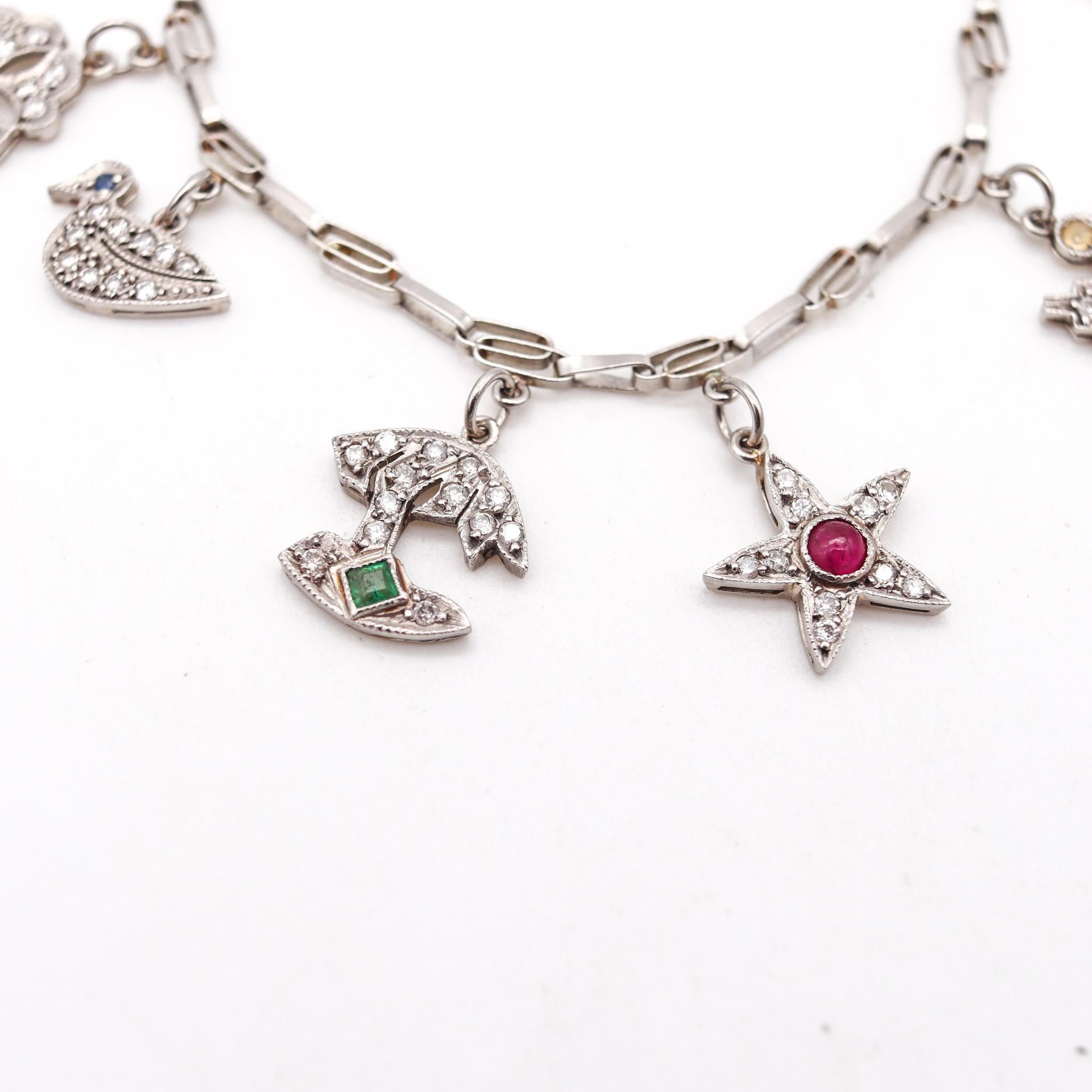 Eleven charms bracelet from the art deco period.

Gorgeous charms bracelet, created during the Art deco period, back in the 1930. It was crafted with beautiful craftsmanship in solid .900/.999 platinum and attached with 11 charms of different